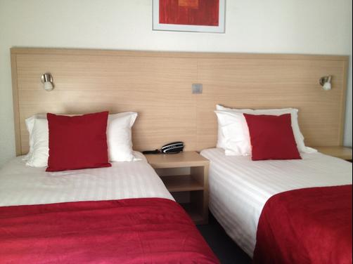 Hotel Teranga - Juan-les-Pins - Bedroom