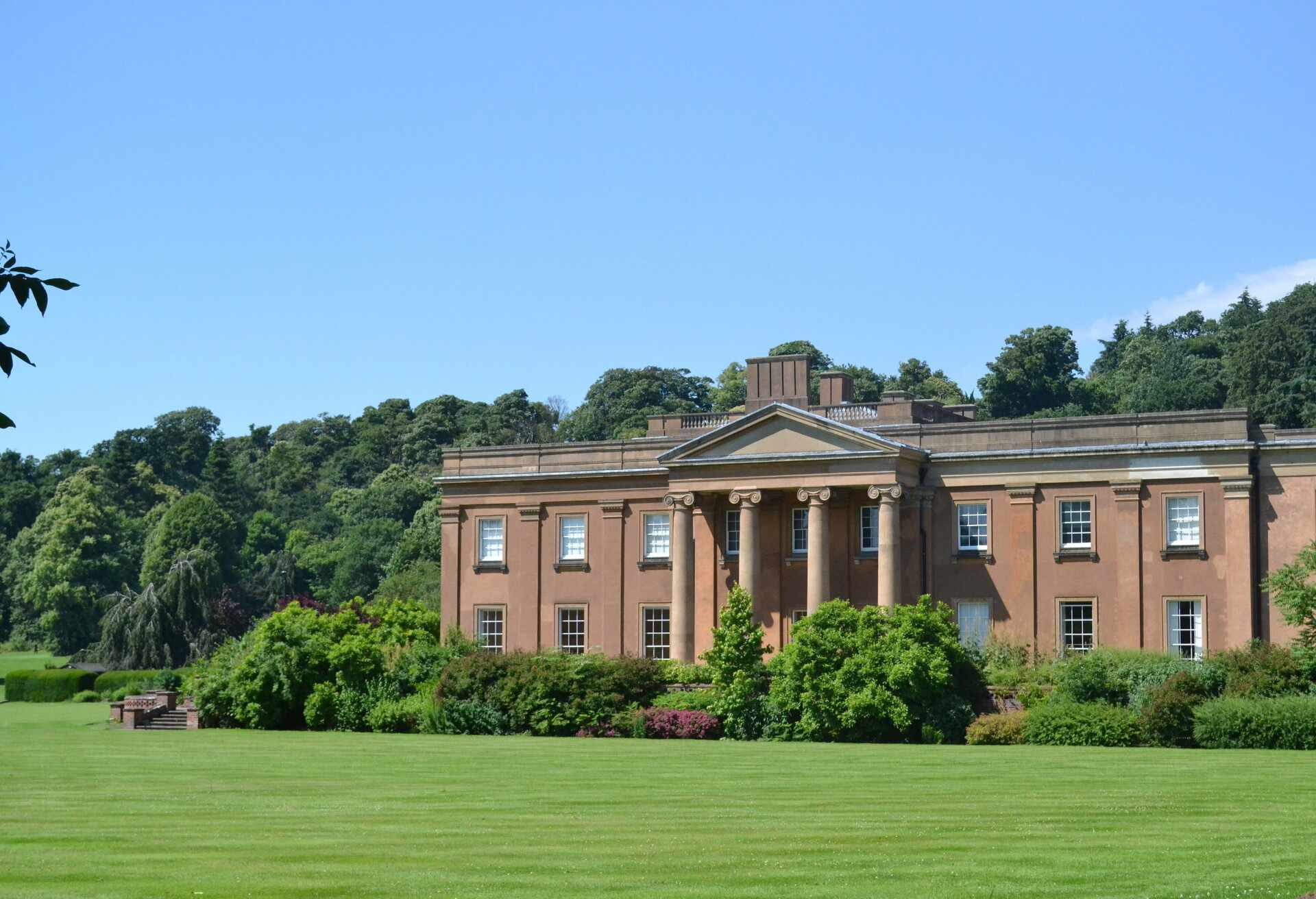 Himley Hall in Dudley, West Midlands on a sunny day; Shutterstock ID 502085251