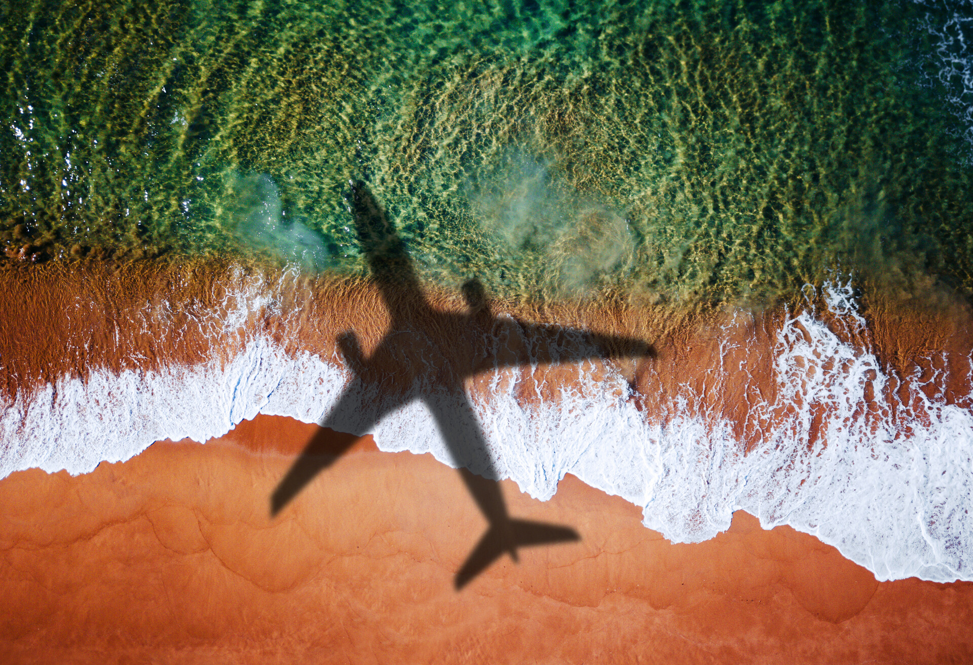 airplane over the beach for the destinations