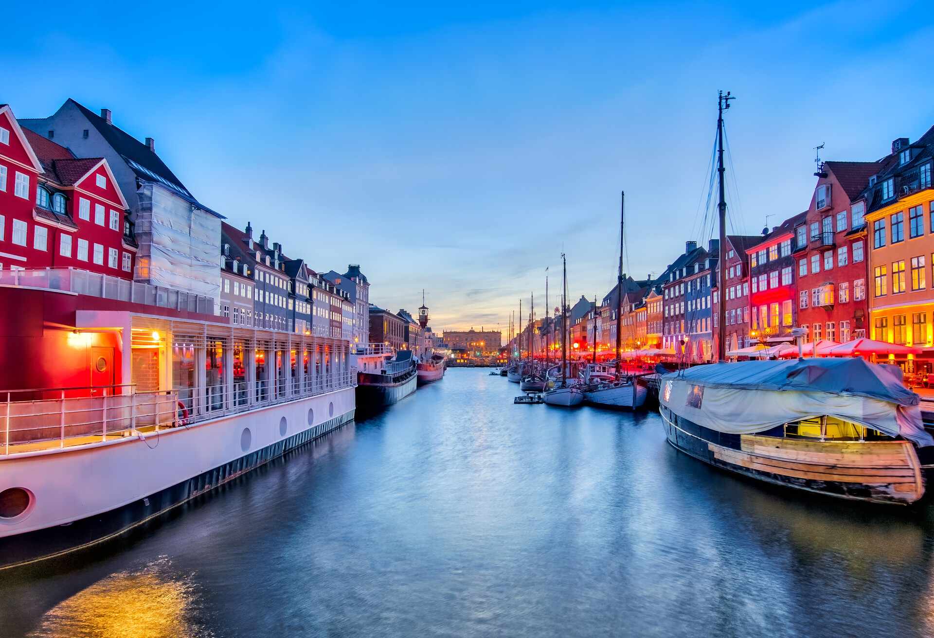 Nyhavn with its picturesque harbor with old sailing ships and colorful facades of old houses in Copenhagen, Denmark.; Shutterstock ID 662549035; Purpose: Image for OOH ad; Brand (KAYAK, Momondo, Any): KAYAK