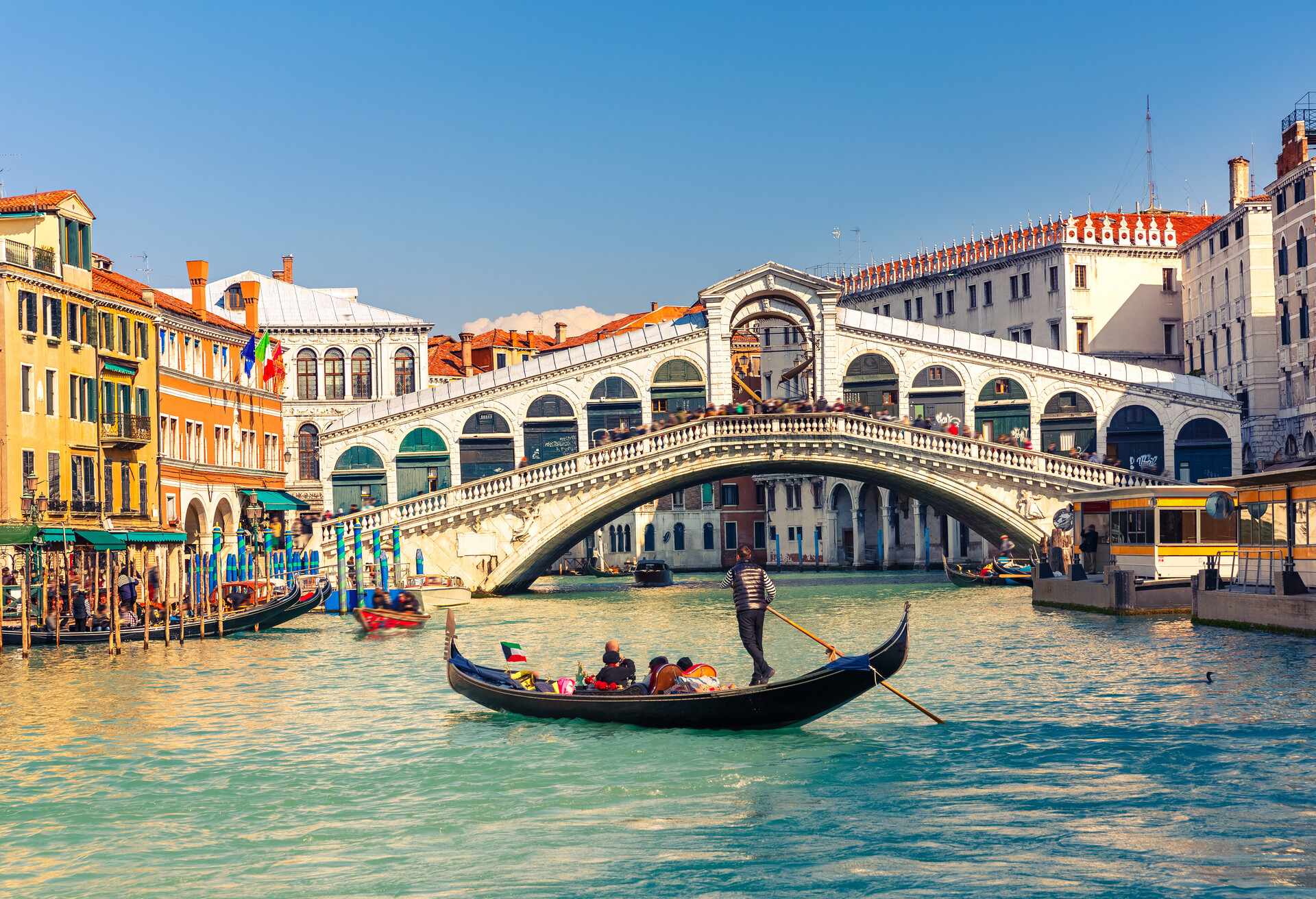 Gondola near Rialto Bridge in Venice, Italy; Shutterstock ID 187378805