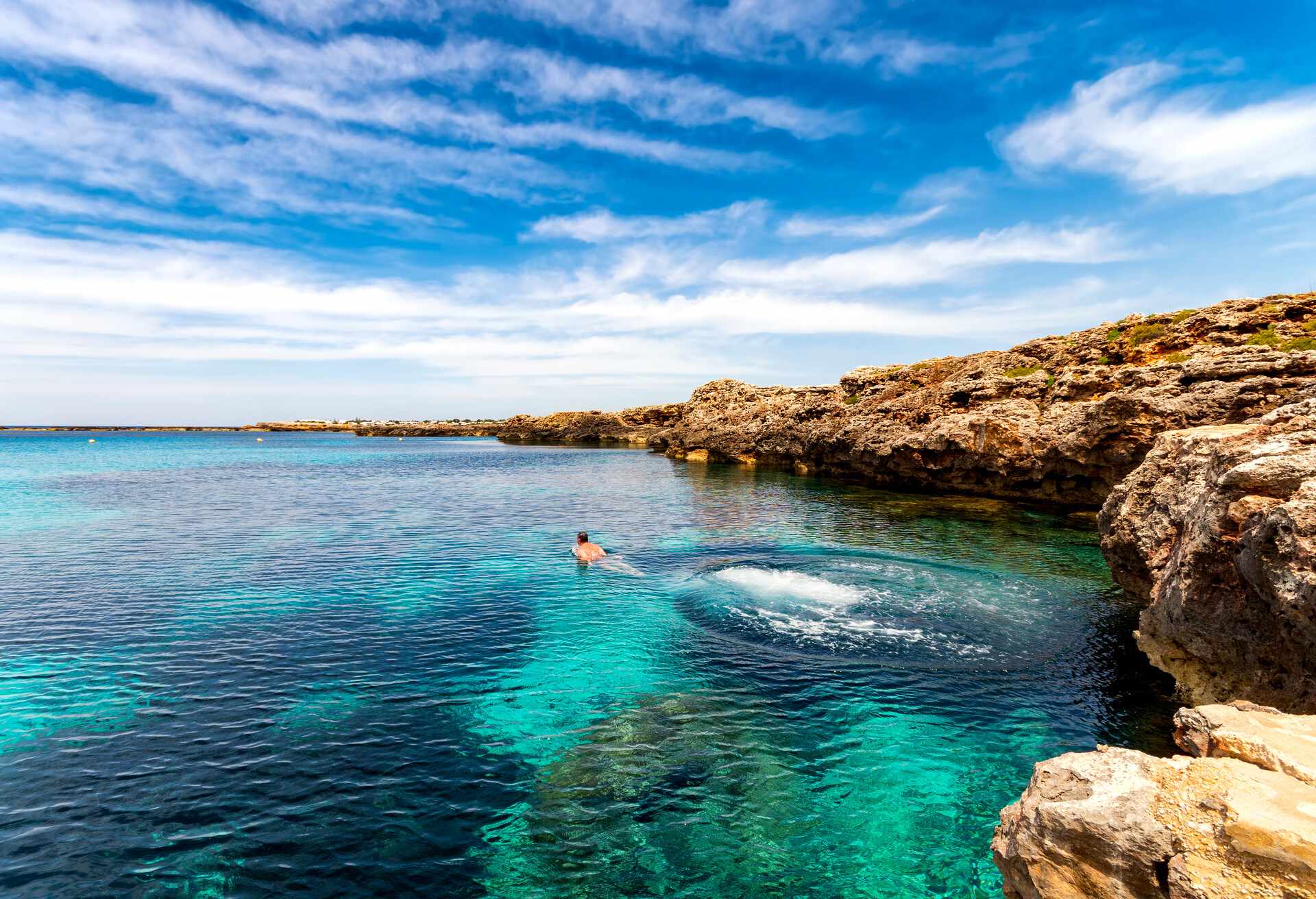 Man Diving, Binissafuller, Menorca, Balearic Islands, Mediterranean, Spain.