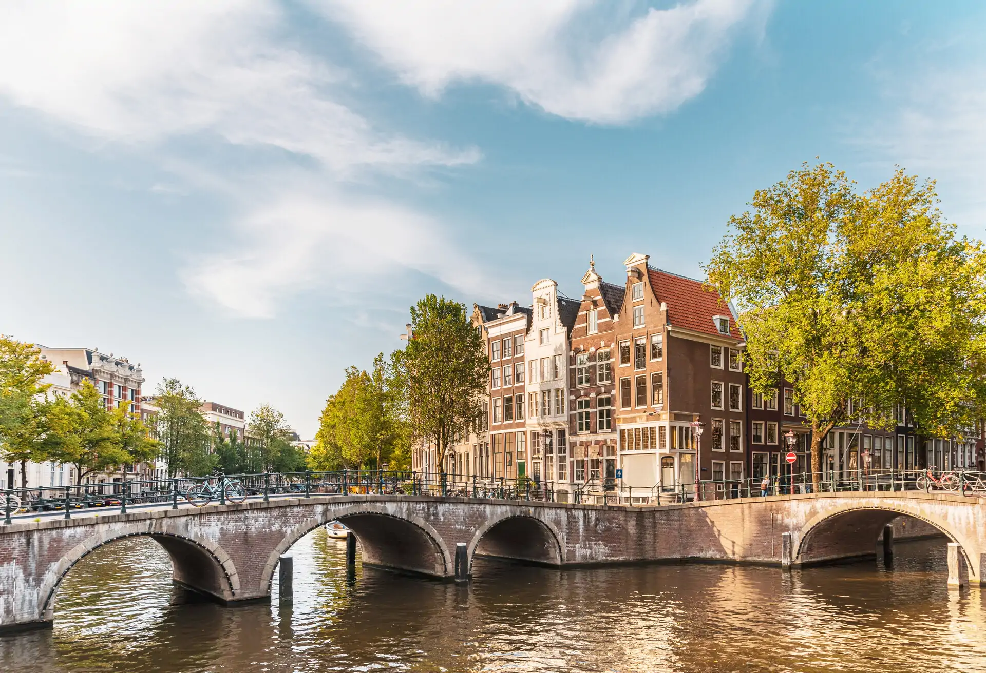 dest_netherlands_amsterdam_bridge_canal_gettyimages-1172736144_universal_within-usage-period_79471