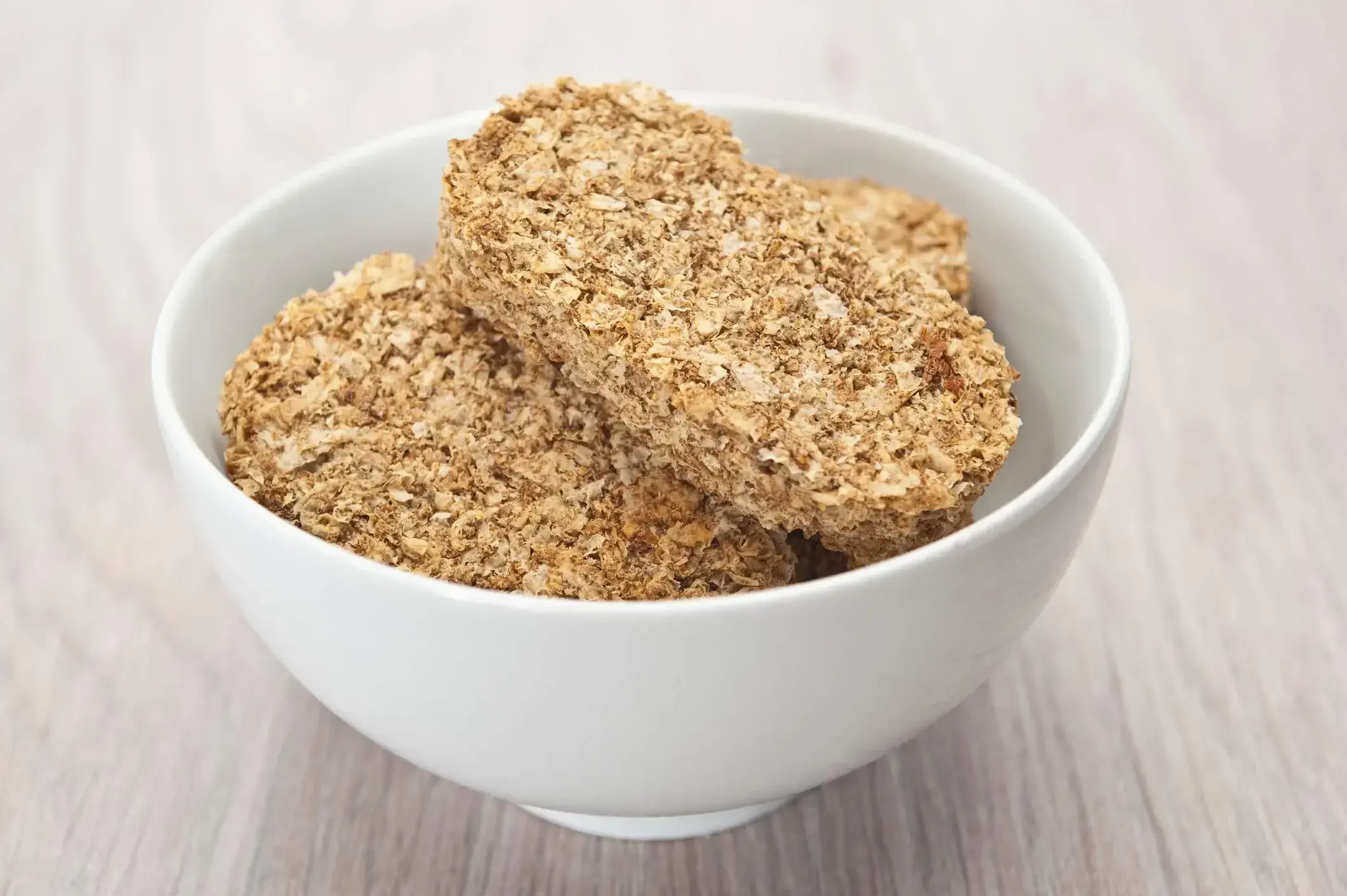 white bowl with pieces of weet-bix