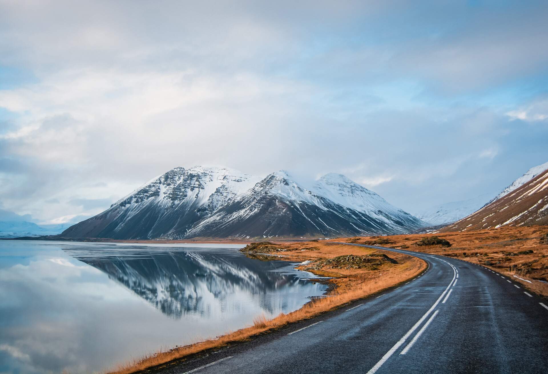 DEST_ICELAND_RING-ROAD_THEME_CAR_DRIVING_WINTER_MOUNTAINS-shutterstock-portfolio_1905505132