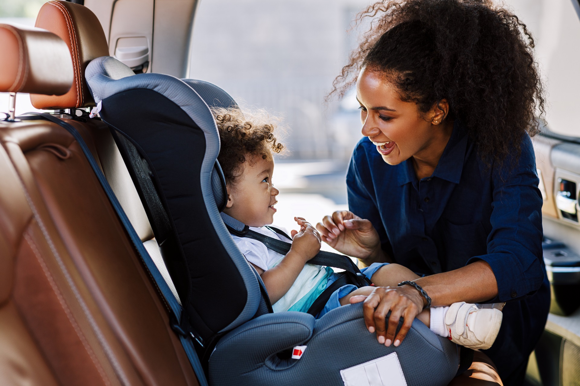 What are the rules for child seats in rental cars?