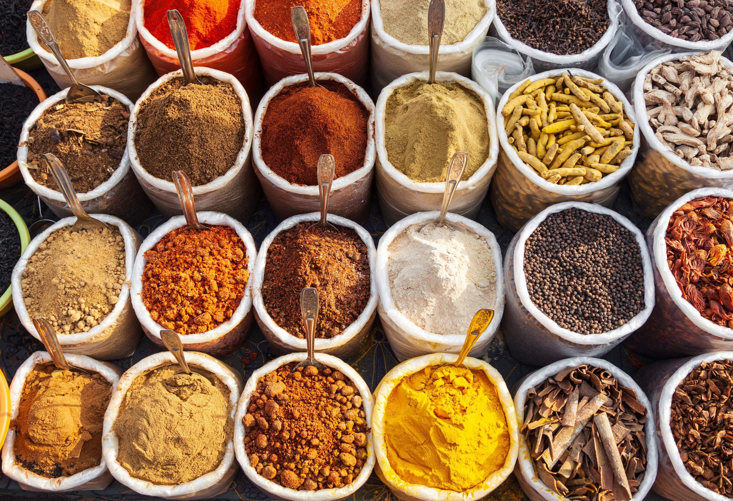 A retail display of colourful dried herbs and spices.