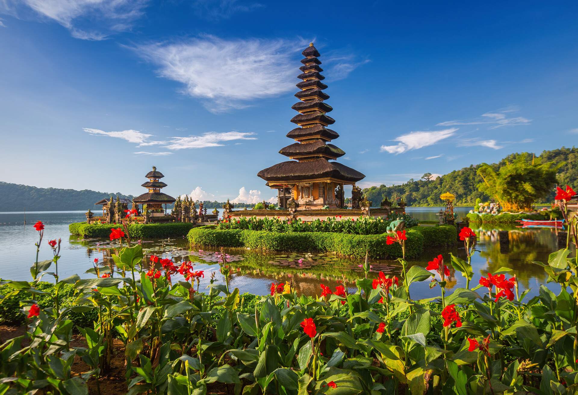 Pura Ulun Danu Bratan, Bali. Hindu temple surrounded by flowers on Bratan lake, Bali. Major Shivaite water temple in Bali, Indonesia. Water temple in Bali, Indonesia. Hindu temple of Bali, Indonesia