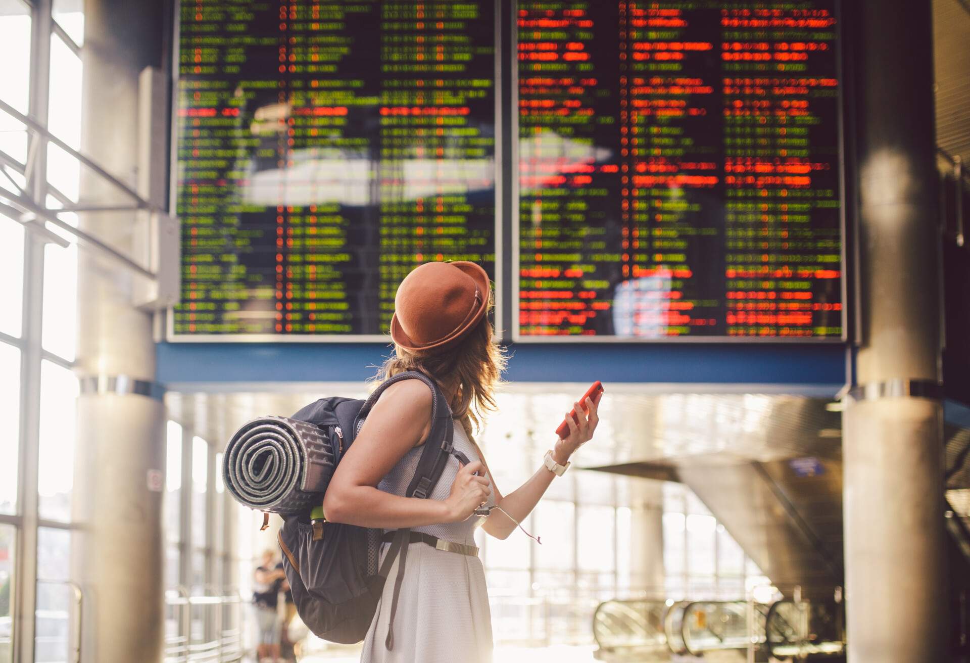 theme_people_woman_at_a_train_station_shutterstock