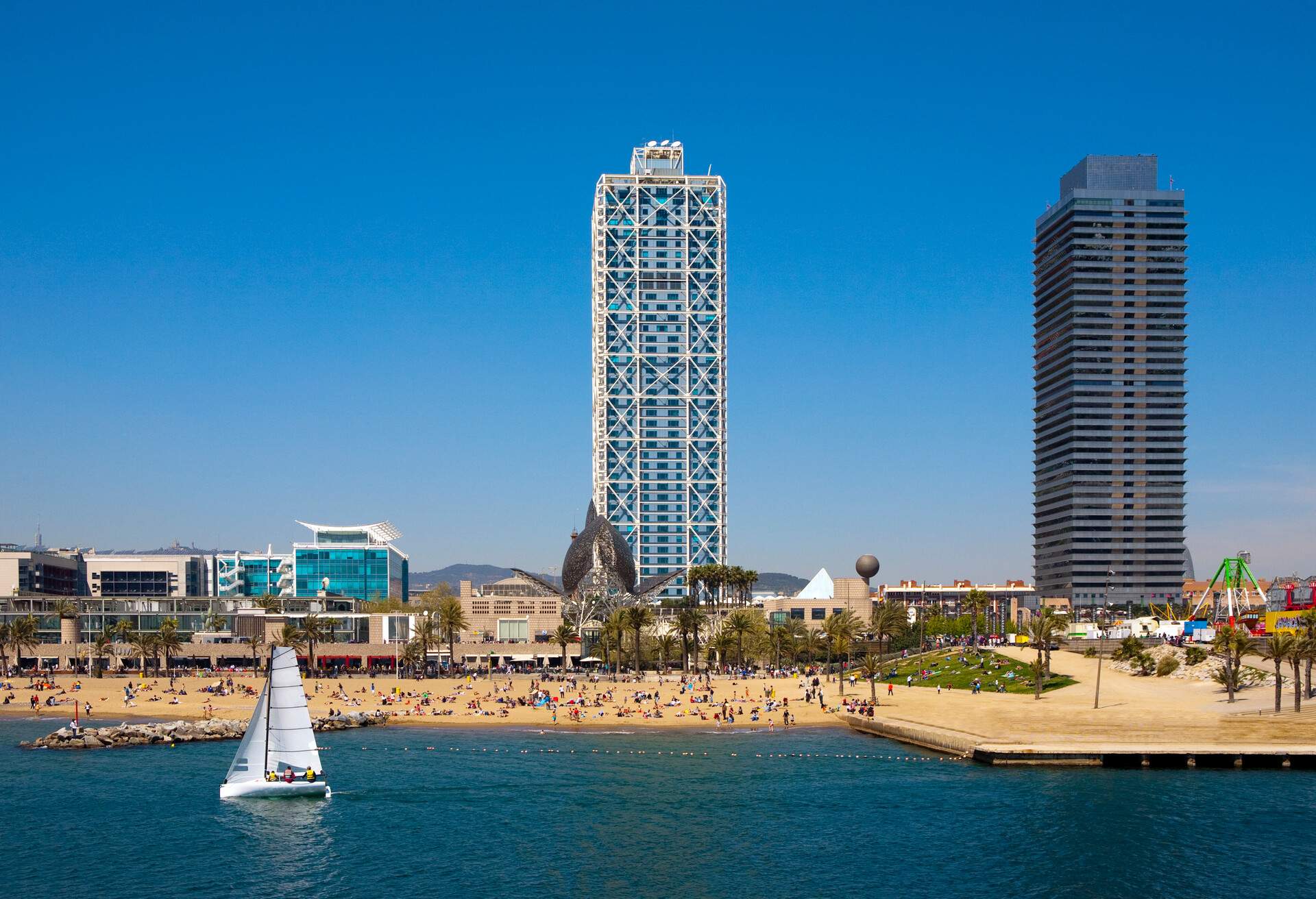 DEST_SPAIN_BARCELONA_BEACH_BOAT_BARCELONETA_GettyImages-102541140