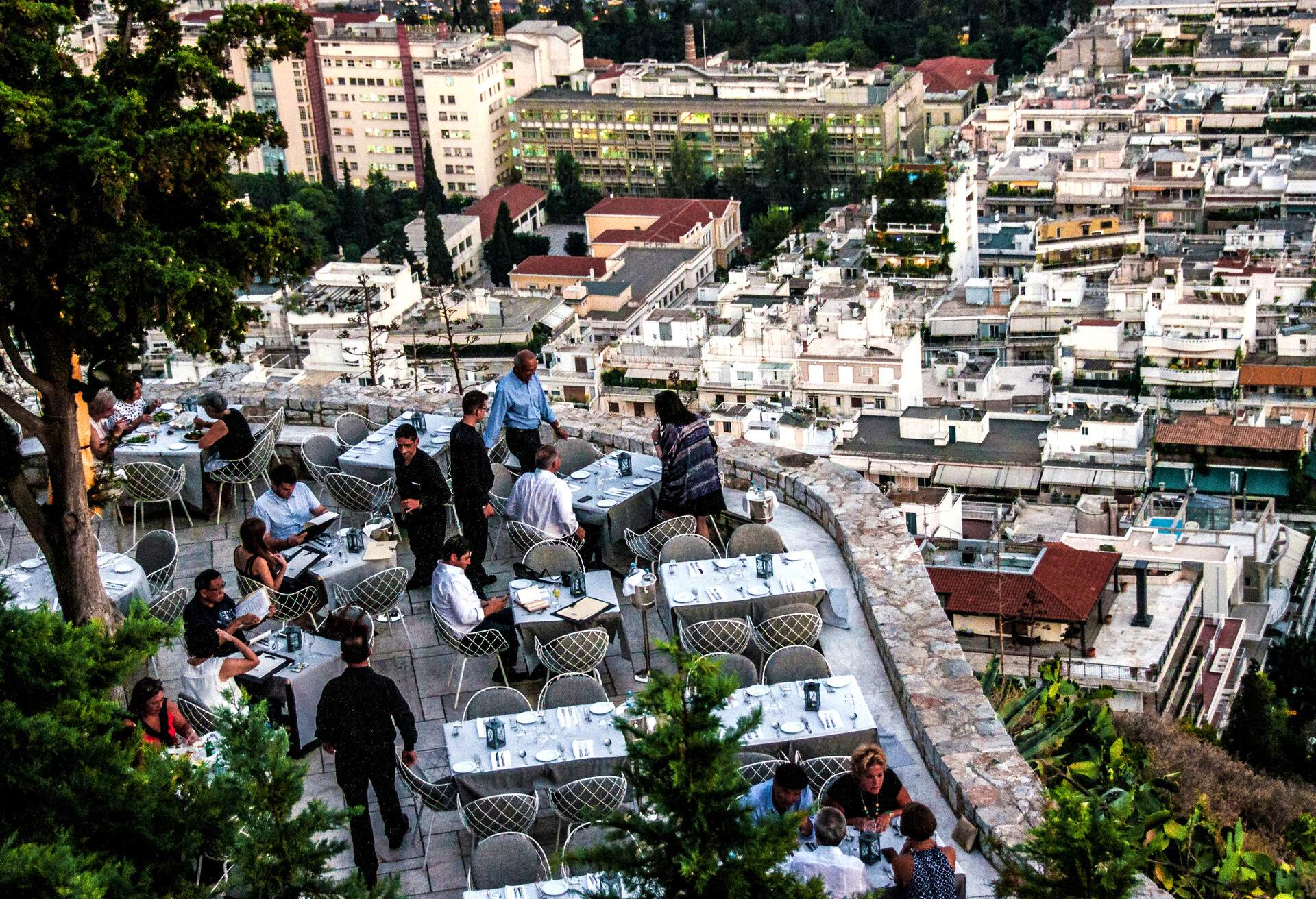 dest_greece_athens_theme_restaurant_rooftop_gettyimages-899494640_universal_within-usage-period_83795.jpg
