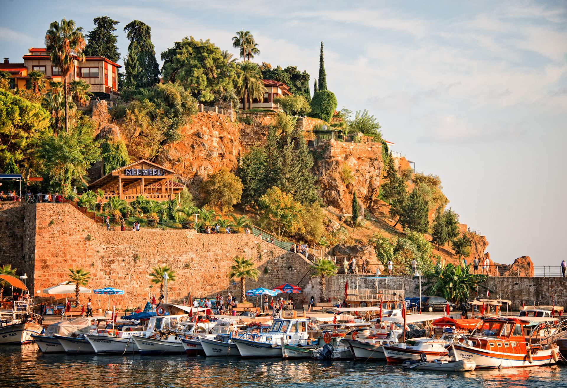 Boats harboured in the sun at Antalya beach