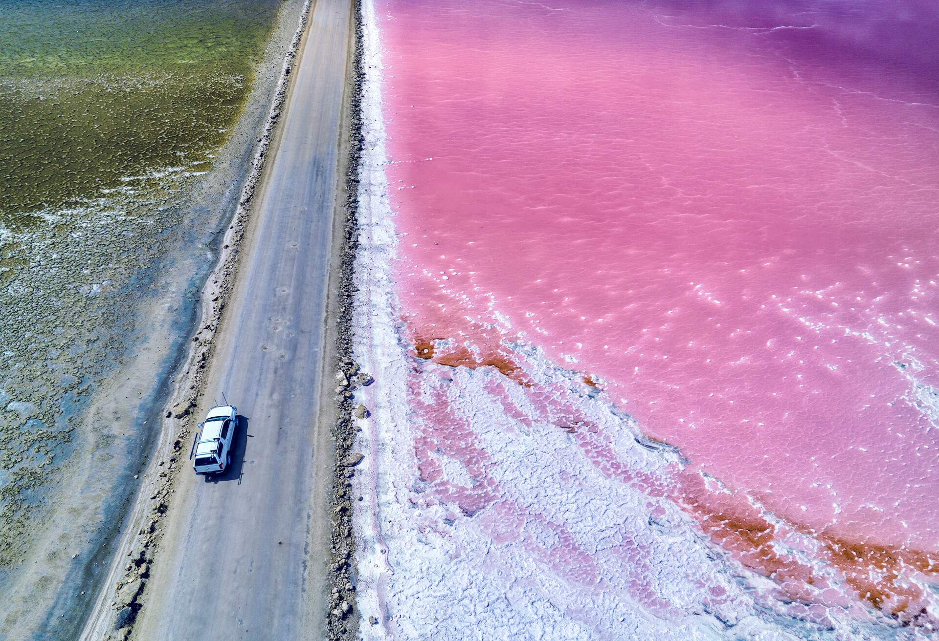 Aerial view over pink salt lake in South Australia. Lake MacDonnell, Point Sinclair - South Australia