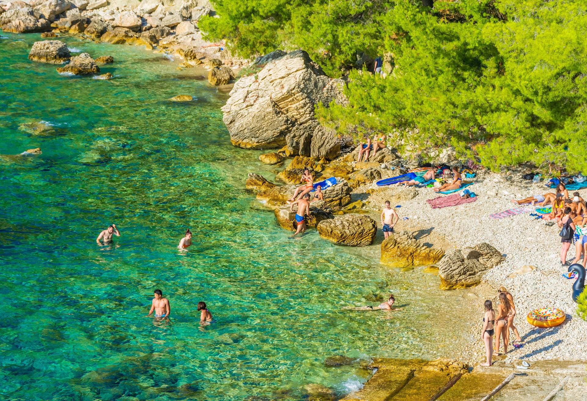 HVAR, CROATIA, AUGUST 8 2019: Tourists enjoying the Malo Zarace Beach
