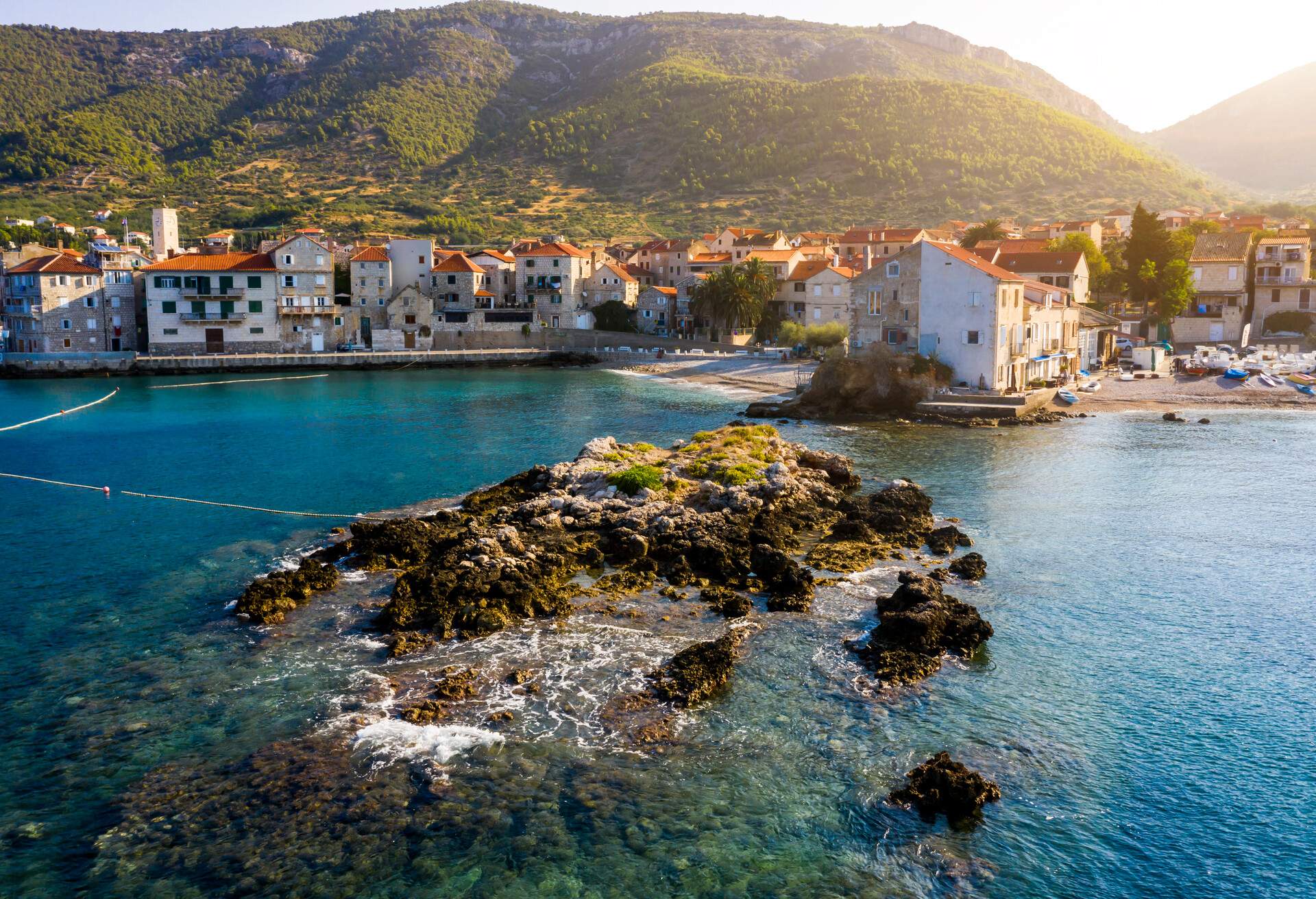 Waterfront scenic view at old fisherman place Komiza on Island Vis, Croatia.