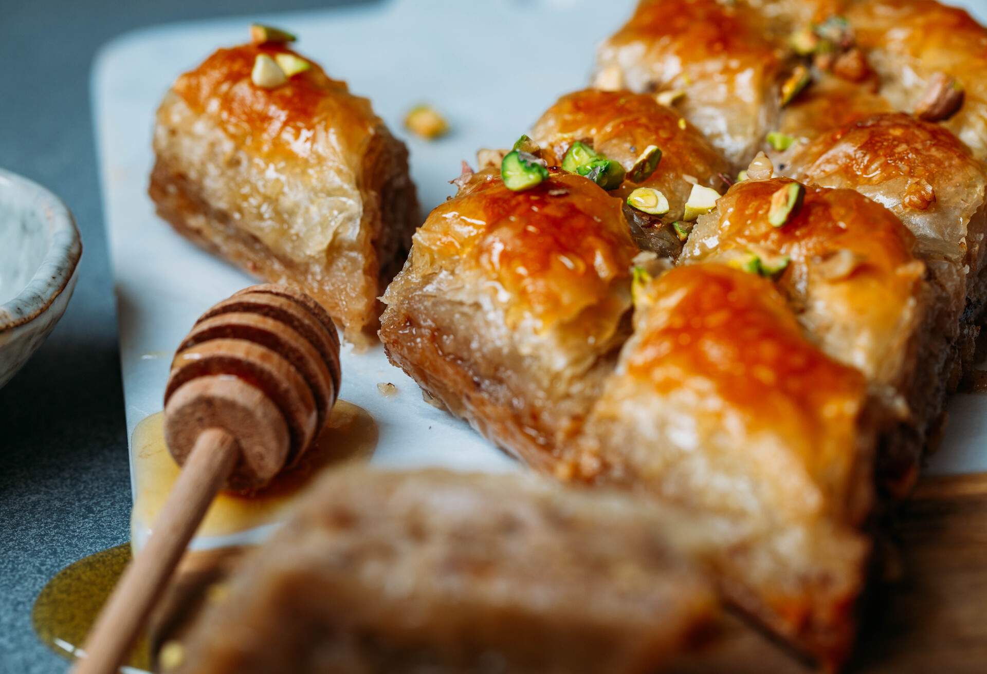 Perfect sweet baklava with pistachio on marble background