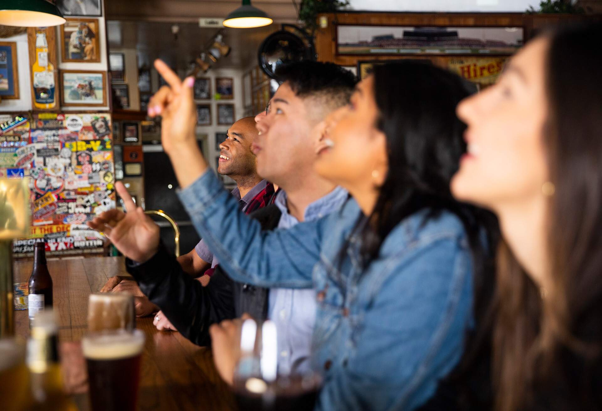 THEME_PEOPLE_GROUP-OF-FRIENDS-IN-A-BAR_GettyImages-1134335778.jpg