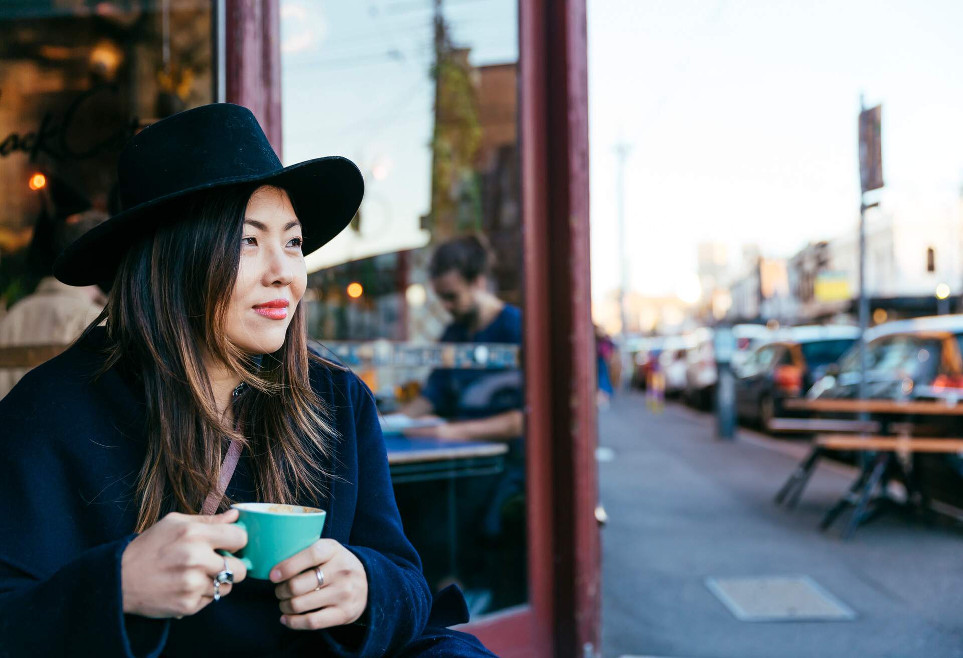 DEST_AUSTRALIA_MELBOURNE_FITZROY_THEME_PEOPLE_WOMAN-TAKING-COFFEE_GettyImages-809632106