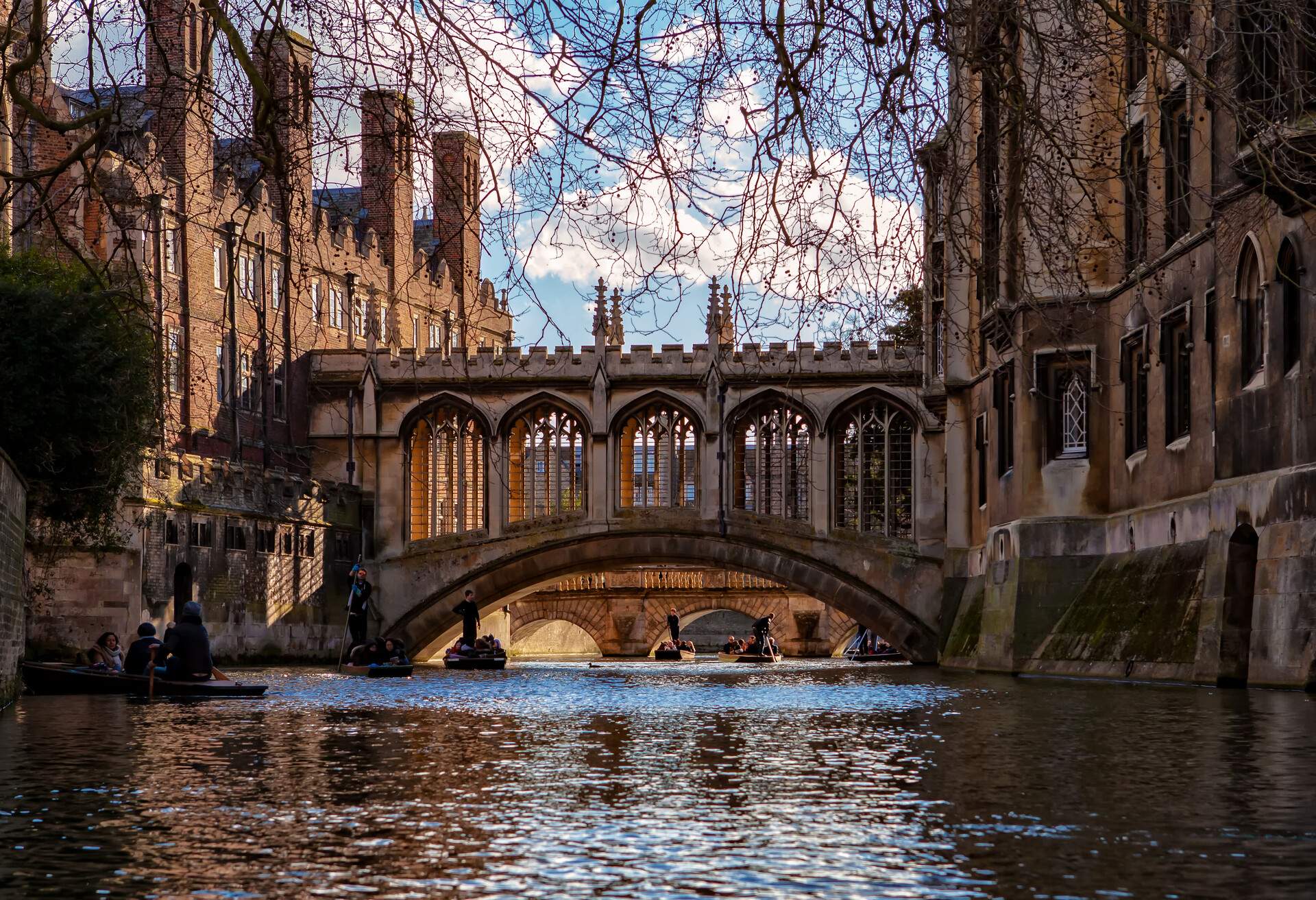 This bridge across the River Cam between the St John's College's Third Court and New Court is probably the most beautiful bridge in Cambridge. This is a view from the north of the bridge which the Kitchen Bridge can be seen in the background and the college second court is on the left.