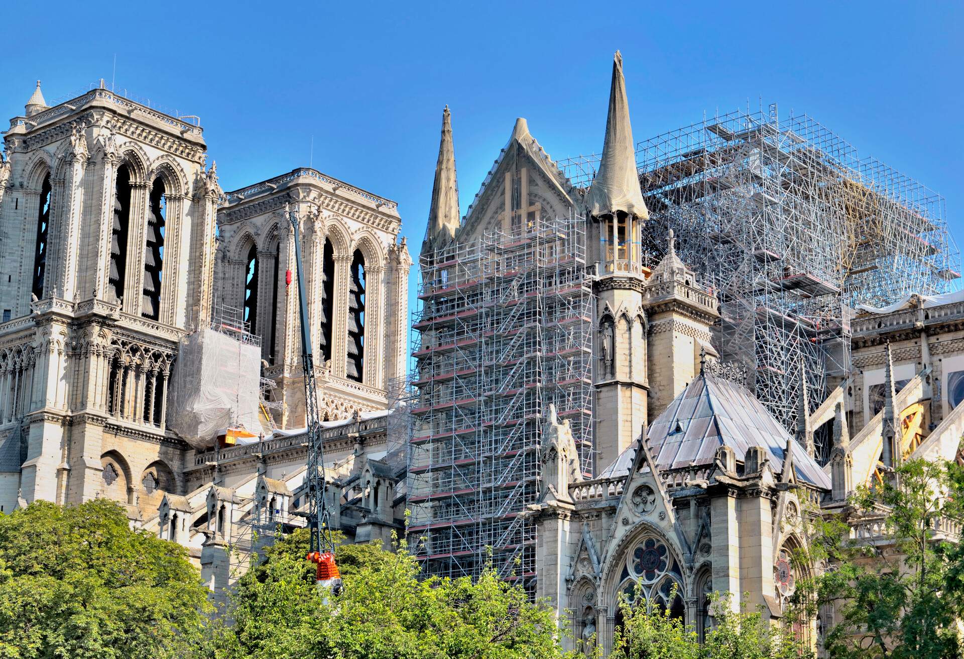 A closer look at the construction site of Notre Dame in Paris on a sunny spring day with a blue sky 