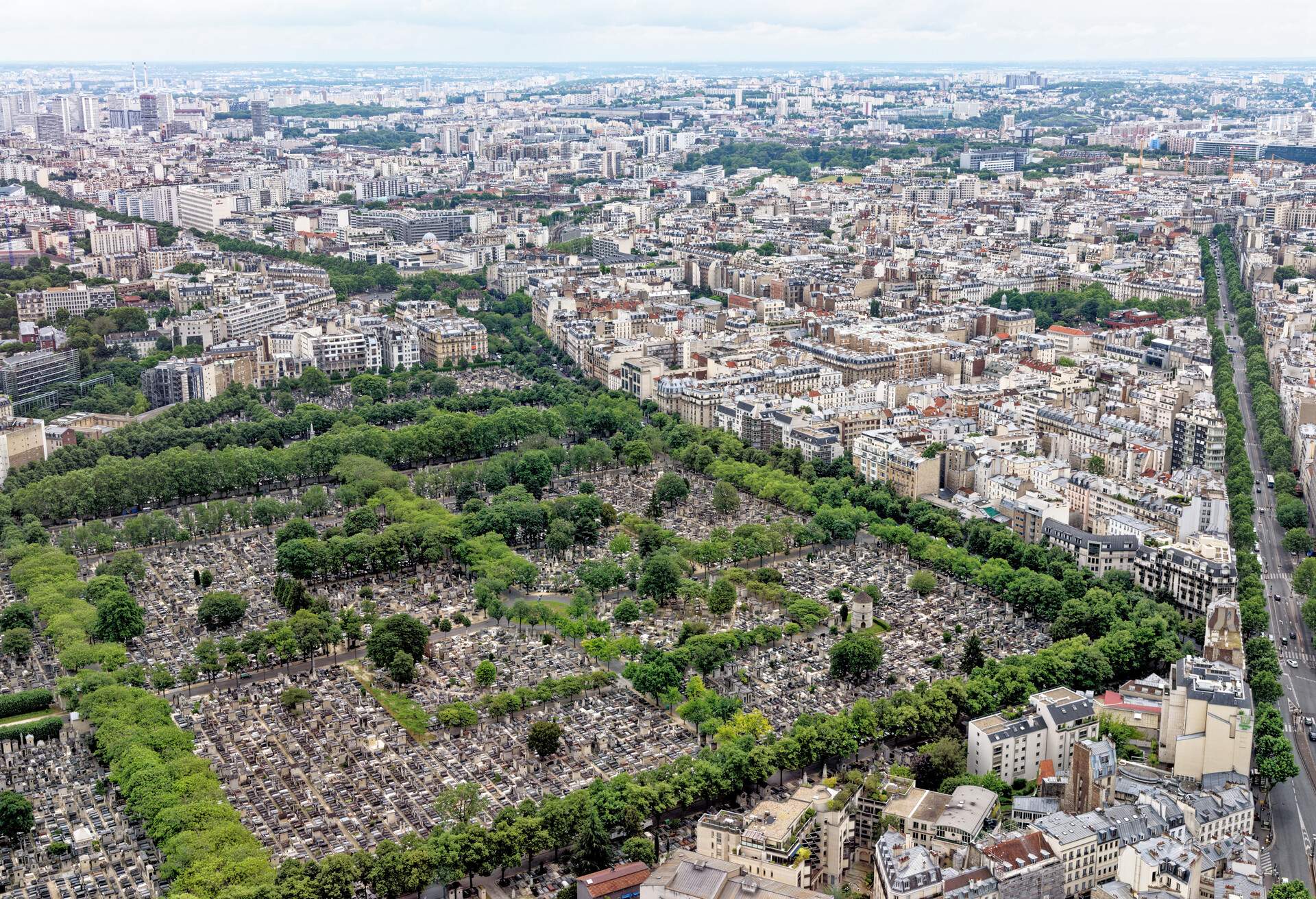 An aerial view of a big cemetery in the middle of Paris