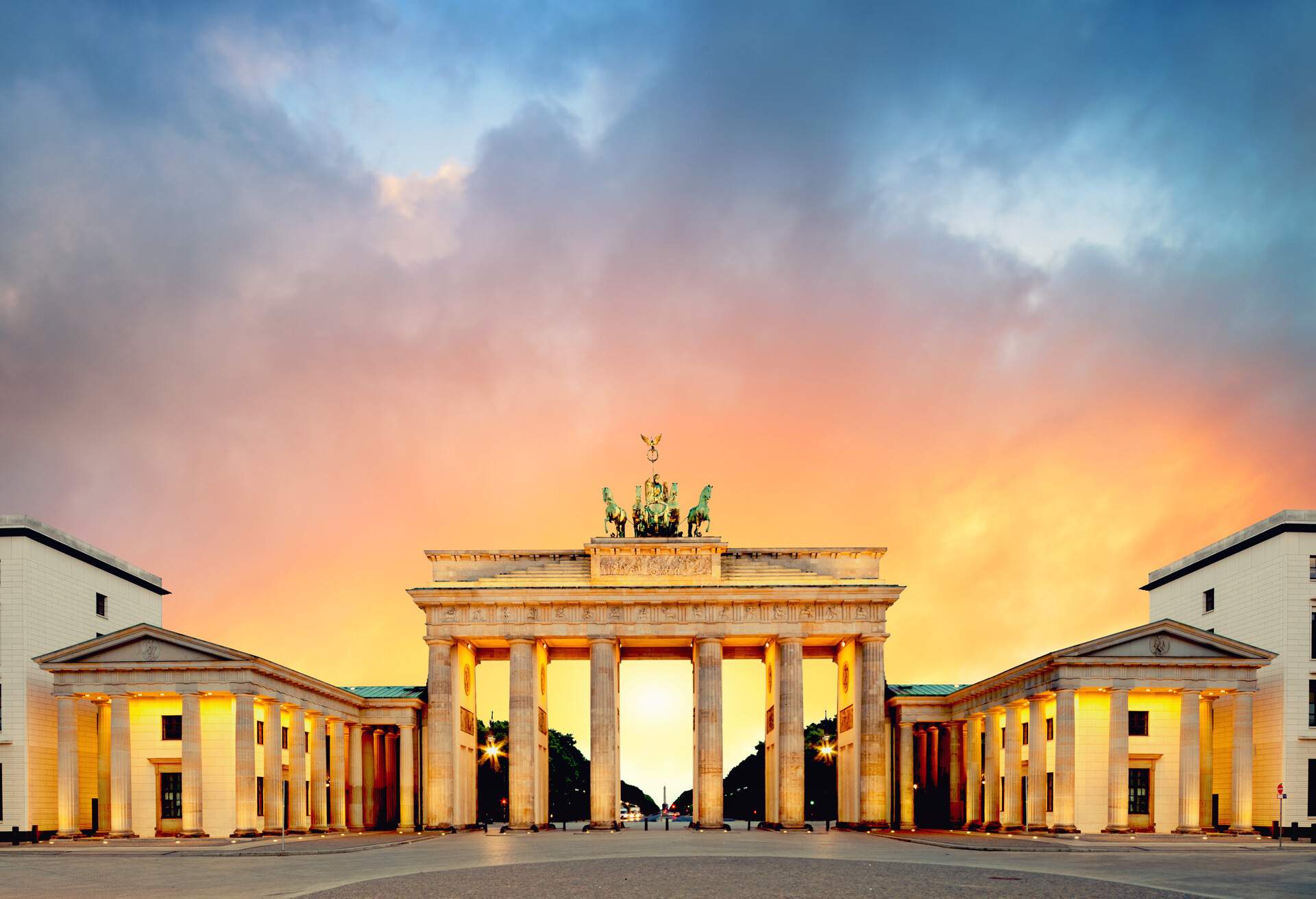 Brandenburg Gate (Brandenburger Tor) in Berlin, Germany, on a sunset, panoramic image; Shutterstock ID 722877493