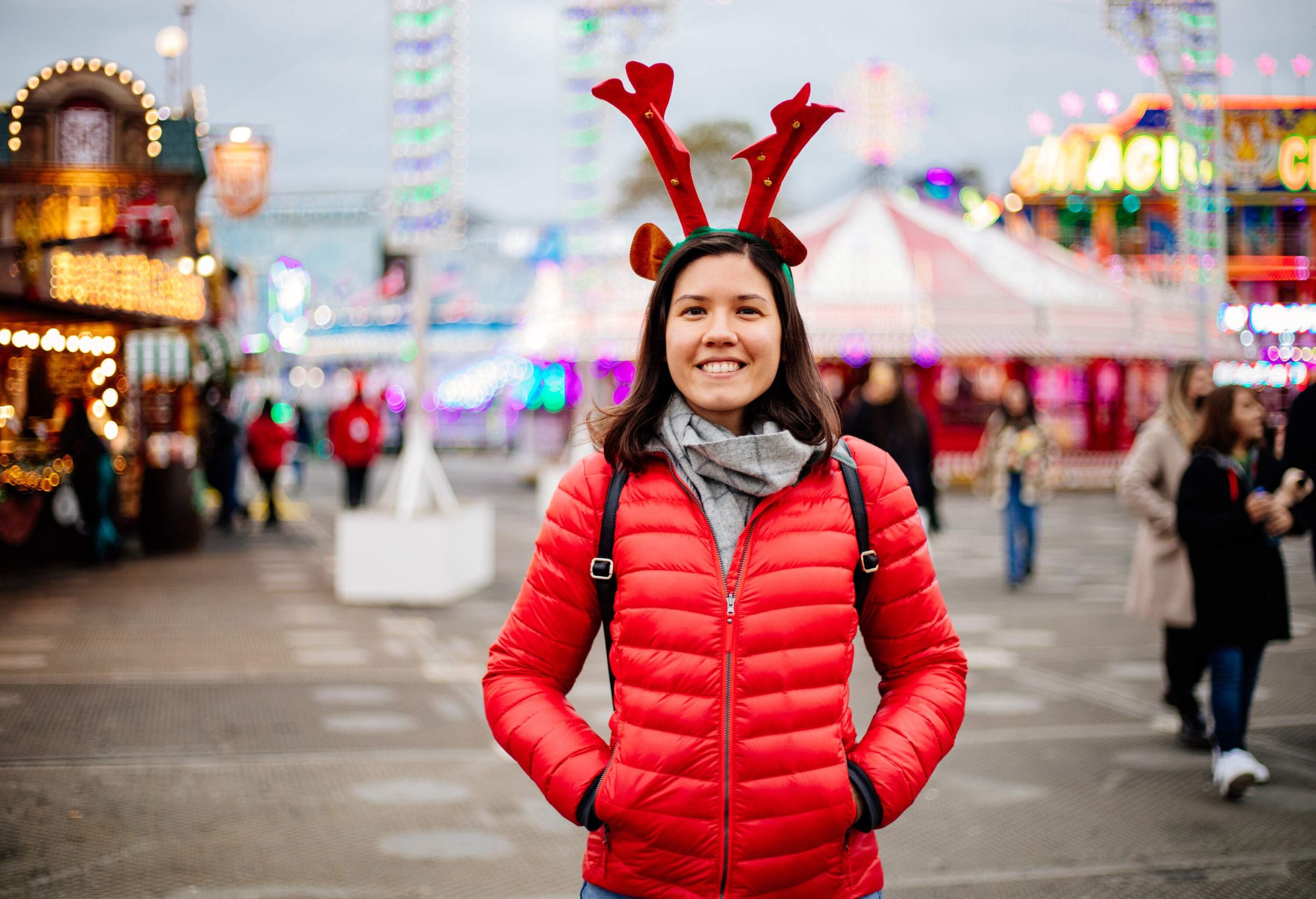 Happy woman at the Christmas market in London.