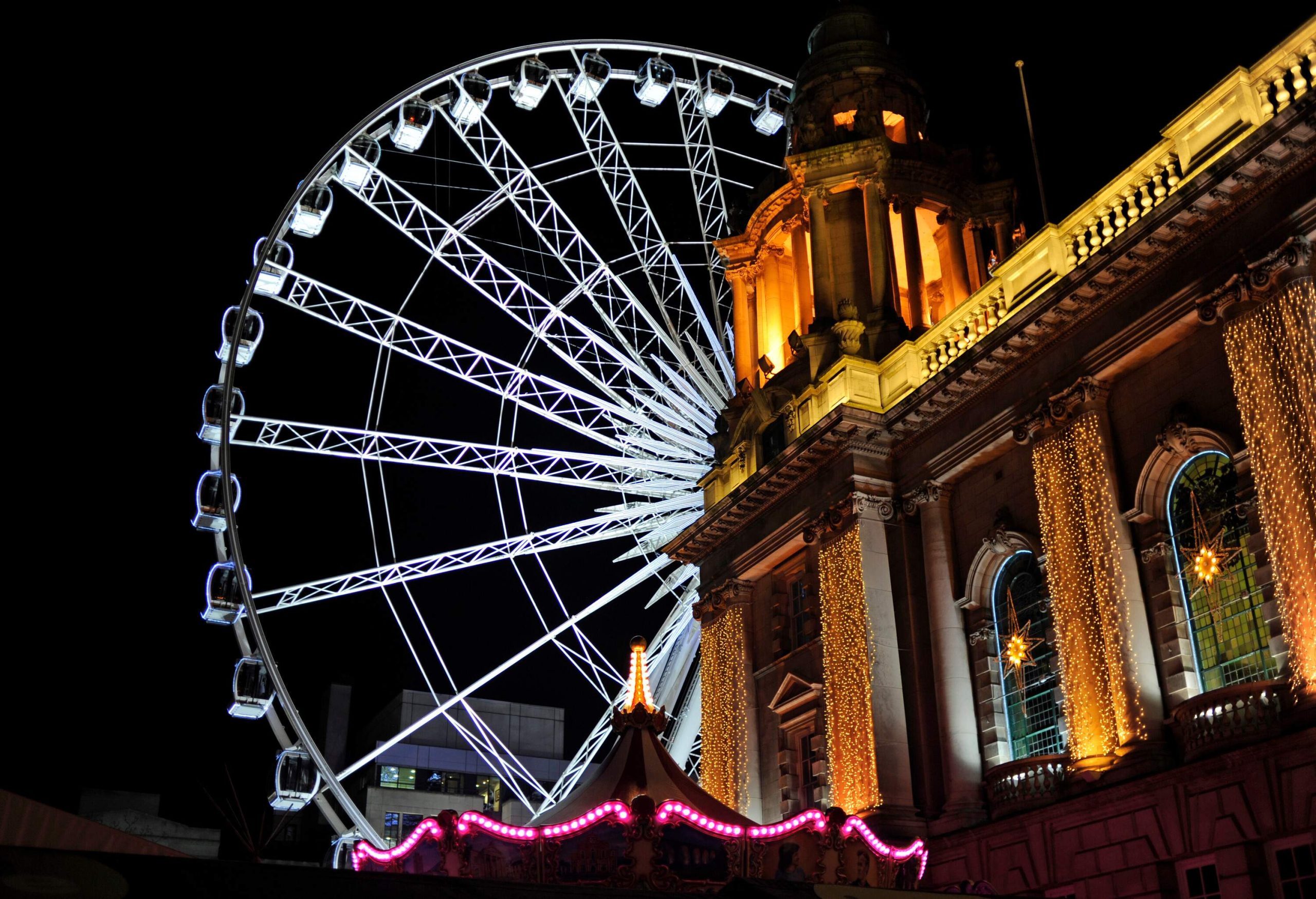 The Big Wheel at Belfast City Hall at night. The Big Wheel is a temporary feature in Belfast city centre and will be due for relocation at some point.