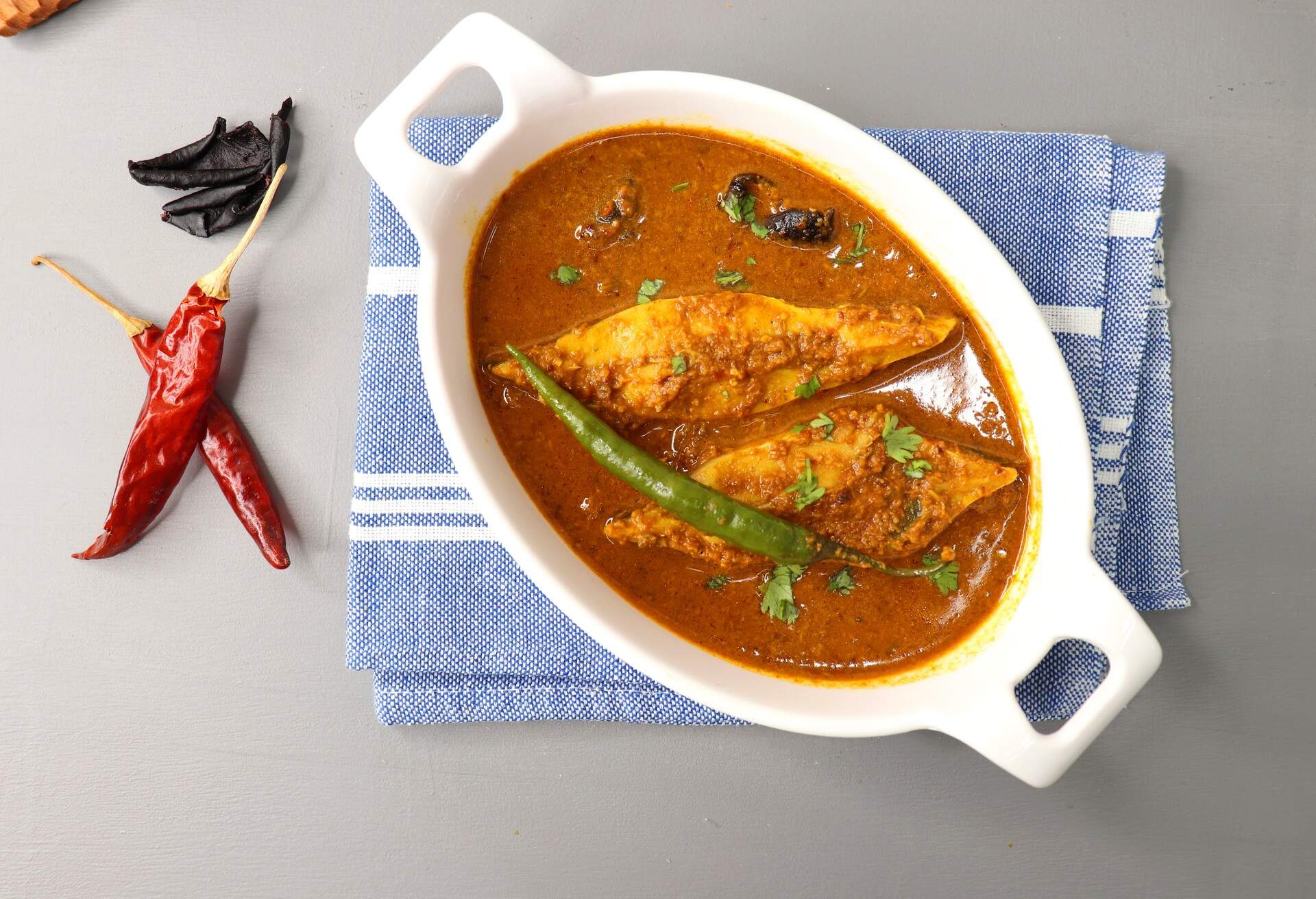 THEME_FOOD_SOUTH_INDIAN_GOAN_POMFRET_BUTTER_FISH_CURRY_GettyImages-1421262778