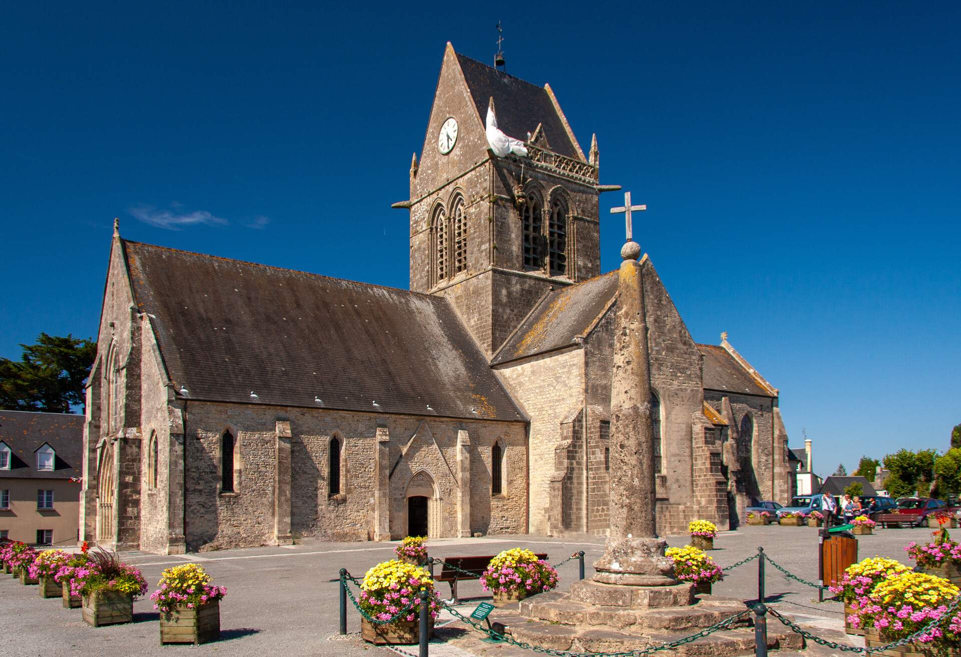 Gothic, built in the 12th century until the 13th century..Dummy parachutist to commemorate the landing of the Allies on d-day