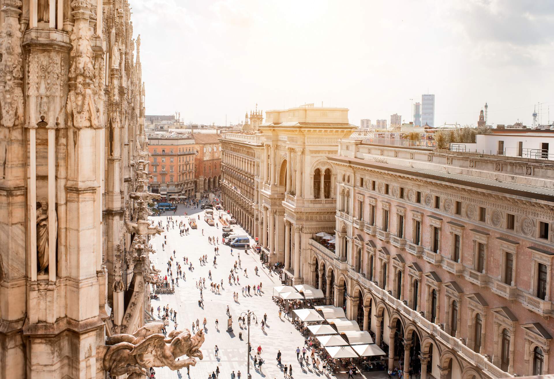 Top view on Duomo square with people walking in the center of Milan