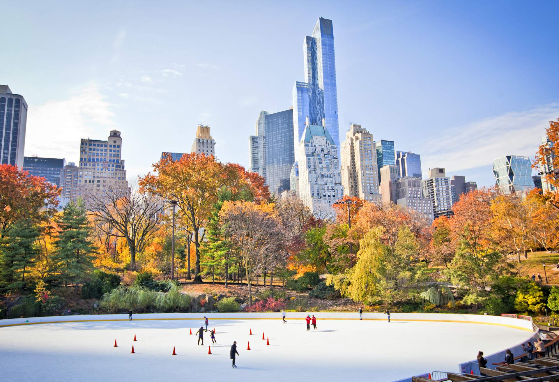 Ice skaters having fun in New York Central Park in fall ; Shutterstock ID 230818327; Purchase Order: SF-06928905; Job: ; Client/Licensee: ; Other: