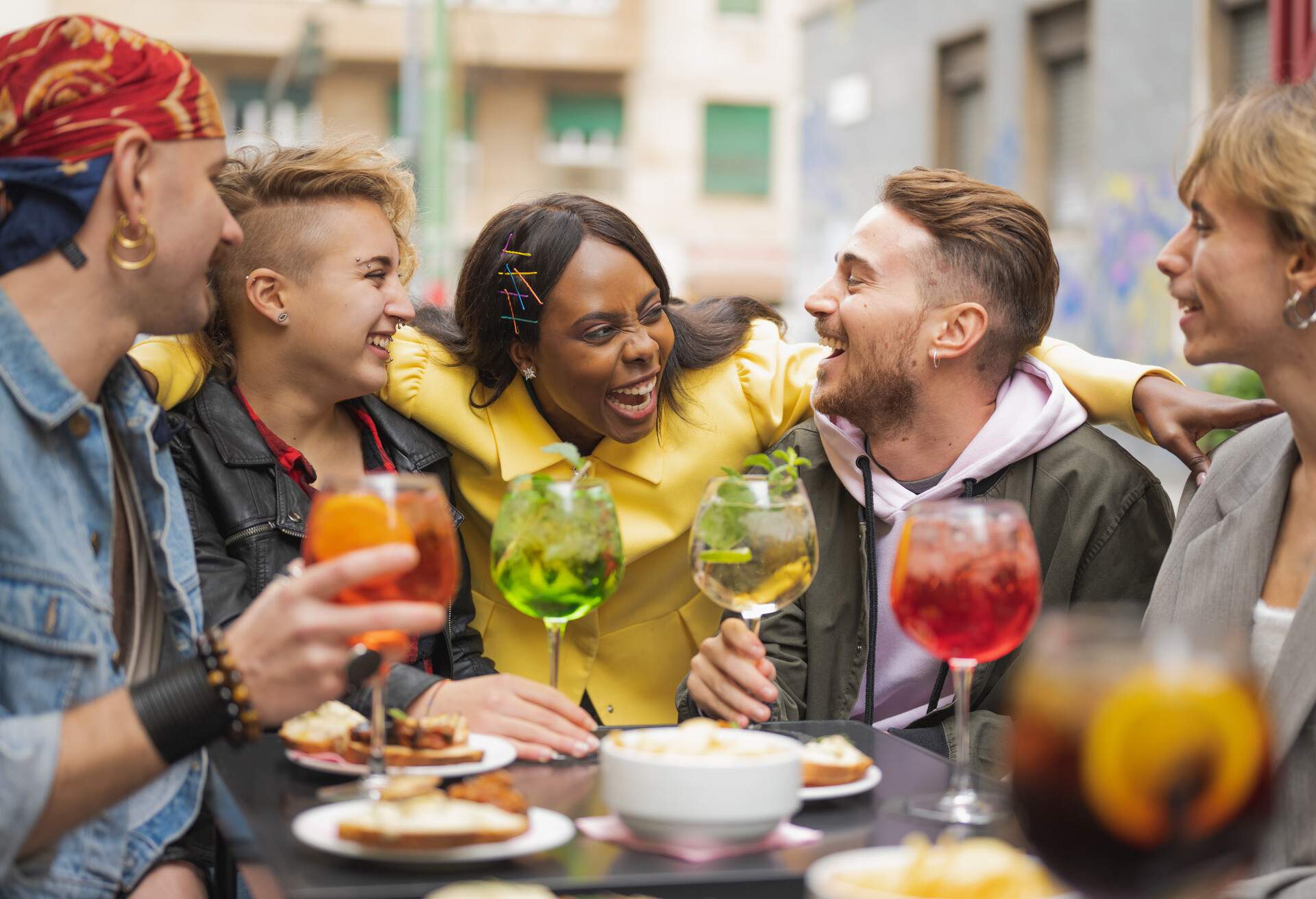 THEME_RESTAURANT_DRINKS_TAPAS_PEOPLE_FRIENDS_LGBTQ_GettyImages-1357653972