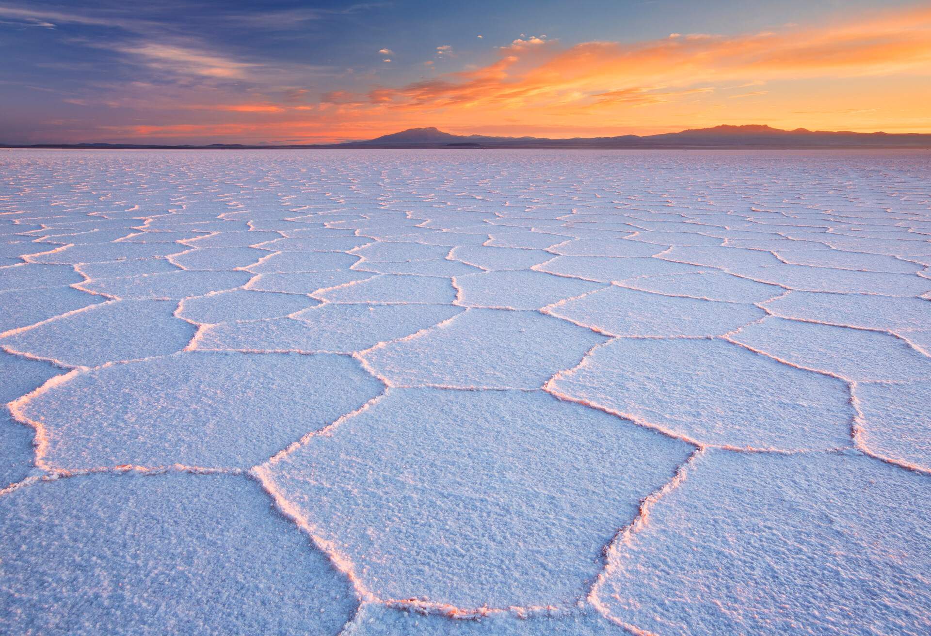 The world's largest salt flat, Salar de Uyuni in Bolivia, sunrise.
