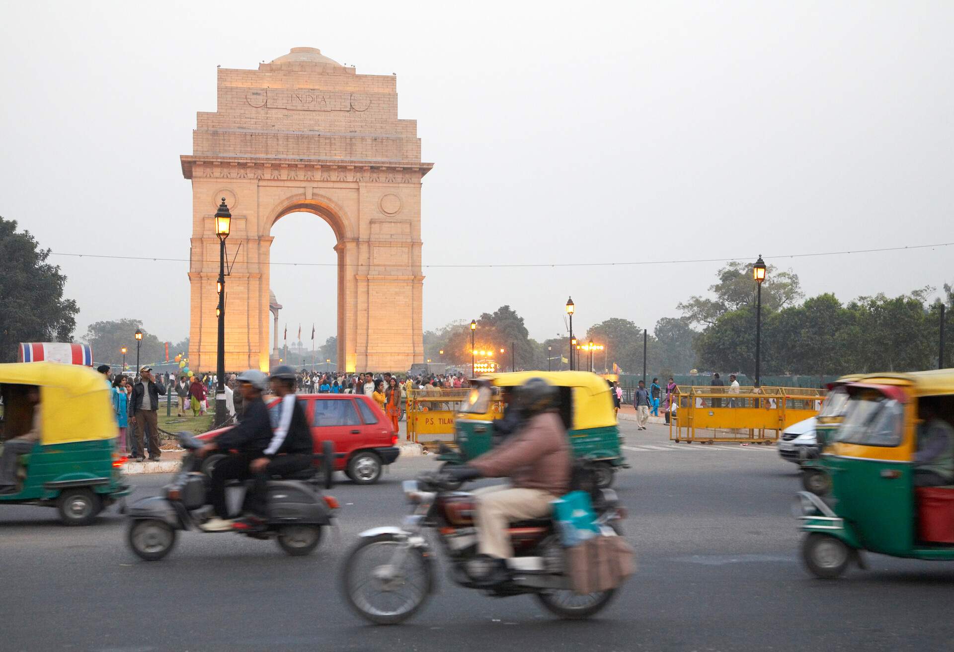 India Gate overlooking busy city street, Delhi, India