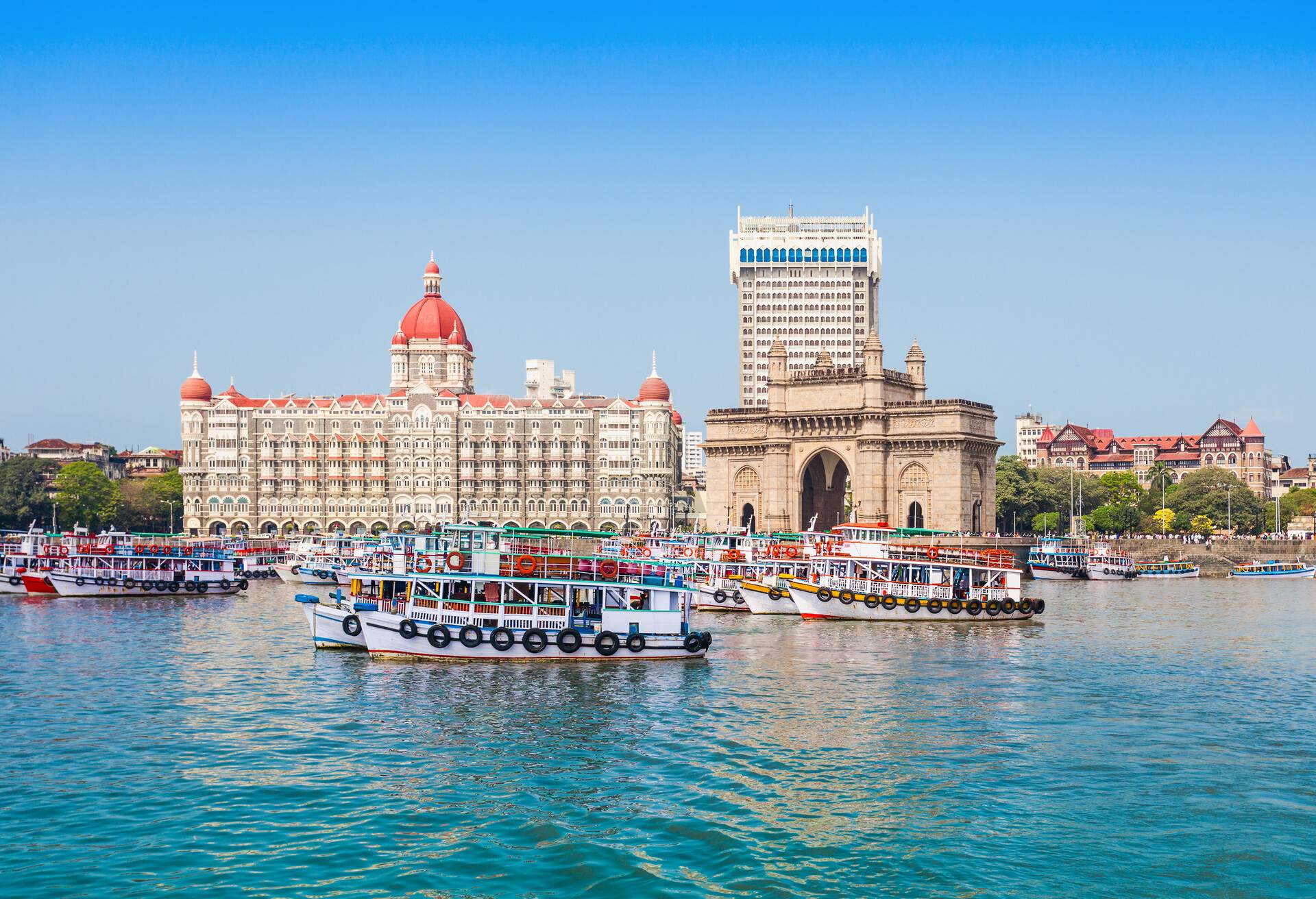 The Gateway of India and boats as seen from the Mumbai Harbour in Mumbai, India