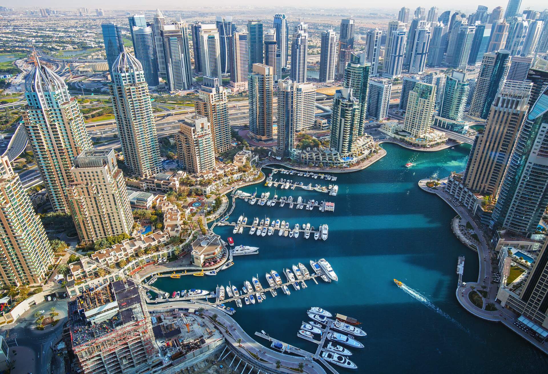 Dubai Marina skyscrapers, port with luxury yachts and marina promenade,Dubai,United Arab Emirates