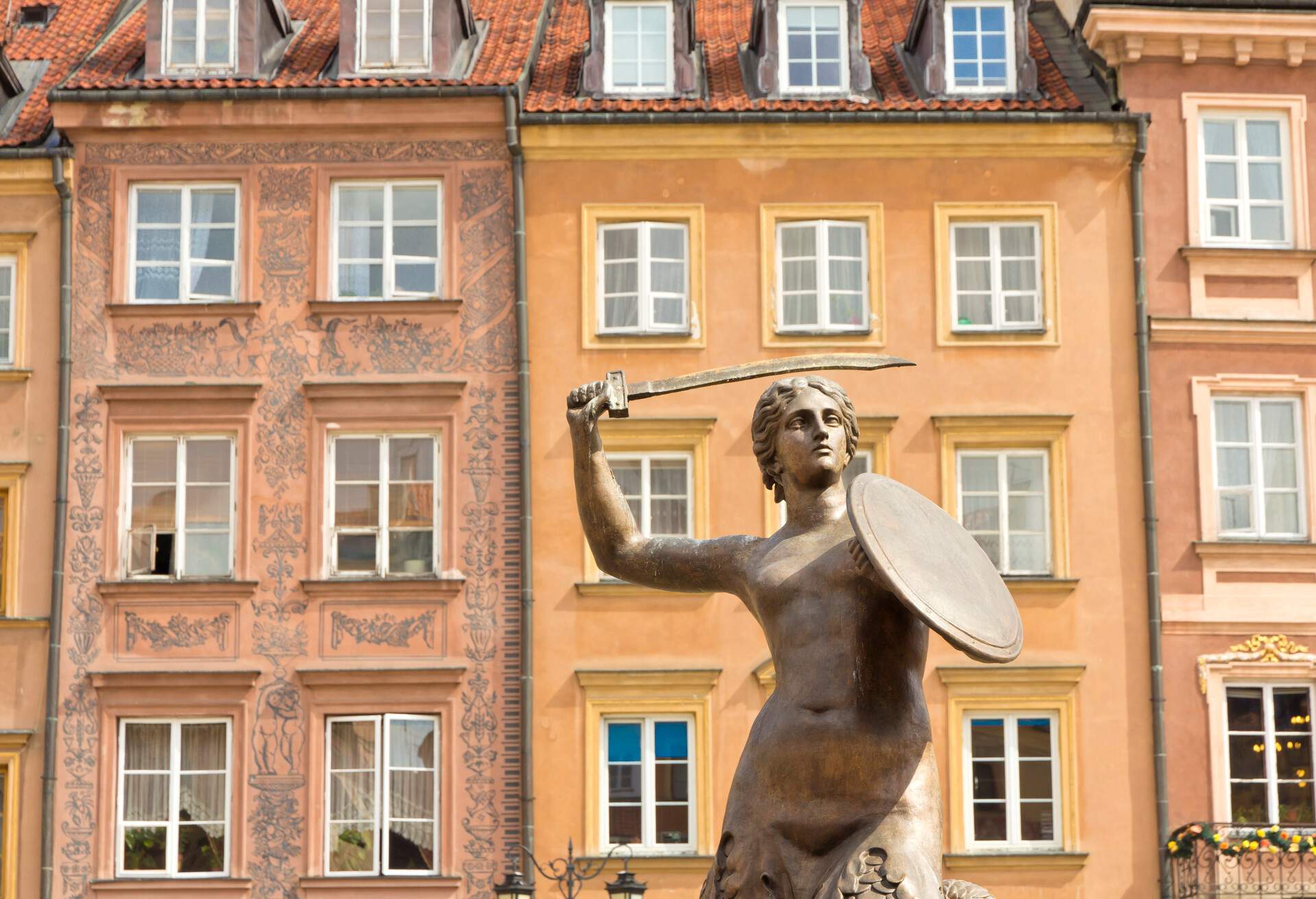 Warsaw Old Town Square and symbol of Warsaw - Mermaid. Sculptor Konstanty Hegel. Sculpture has been done in 1855 year. It stand in Public place - Warsaw Old Town Square.