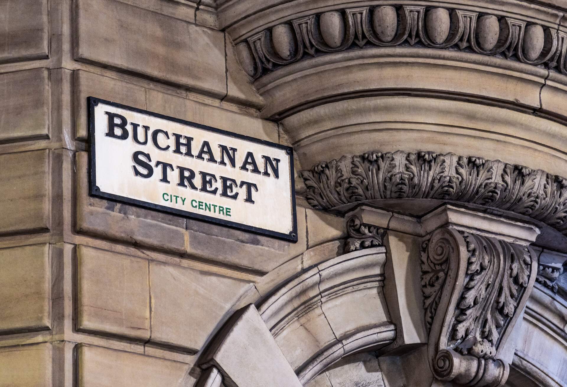 A sign for Buchanan Street in Glasgow, Scotland. The street is in the heart of the city centre, and is a well known shopping street.