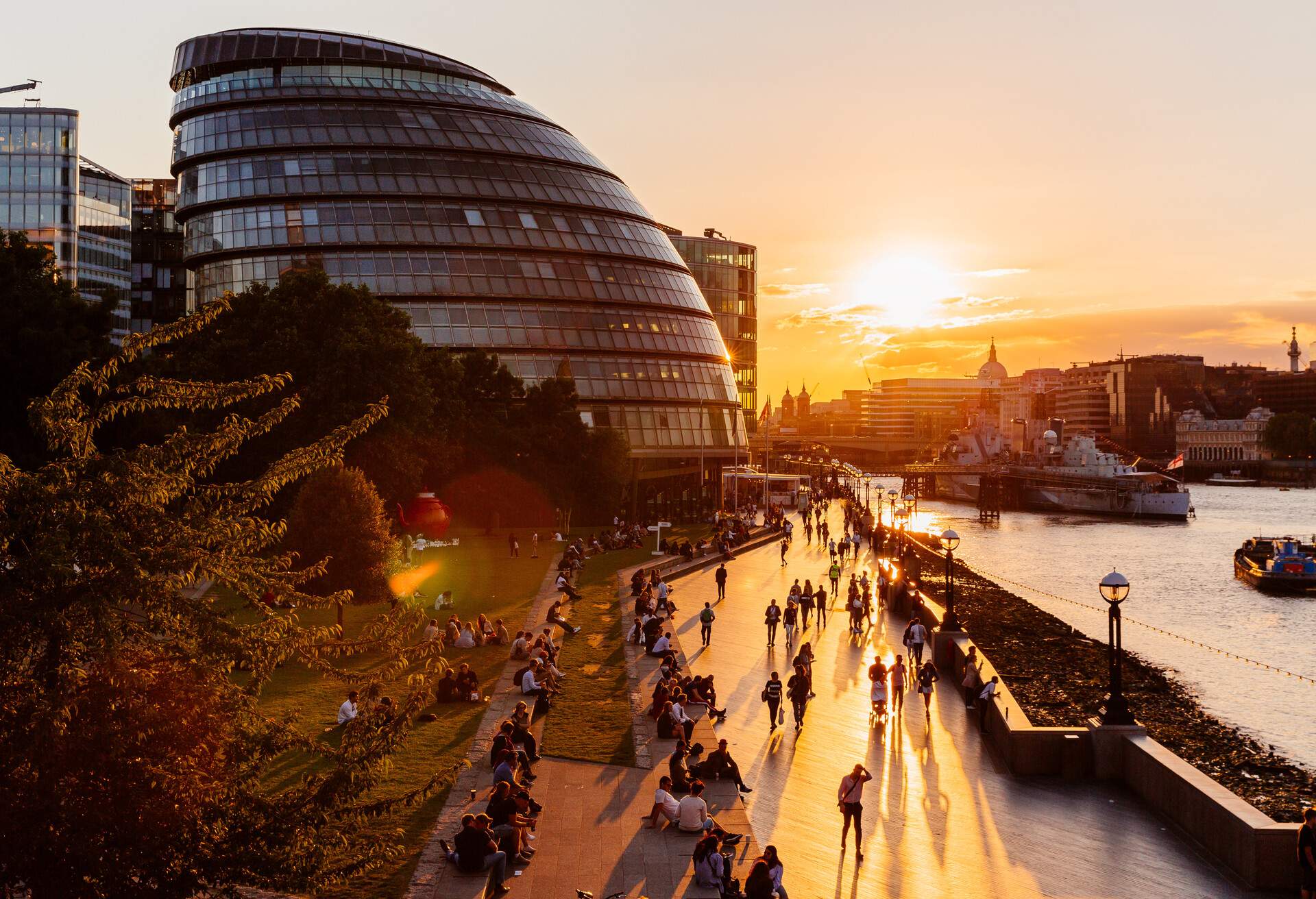 View of London's City Hall from a high angle at sunset with people walking