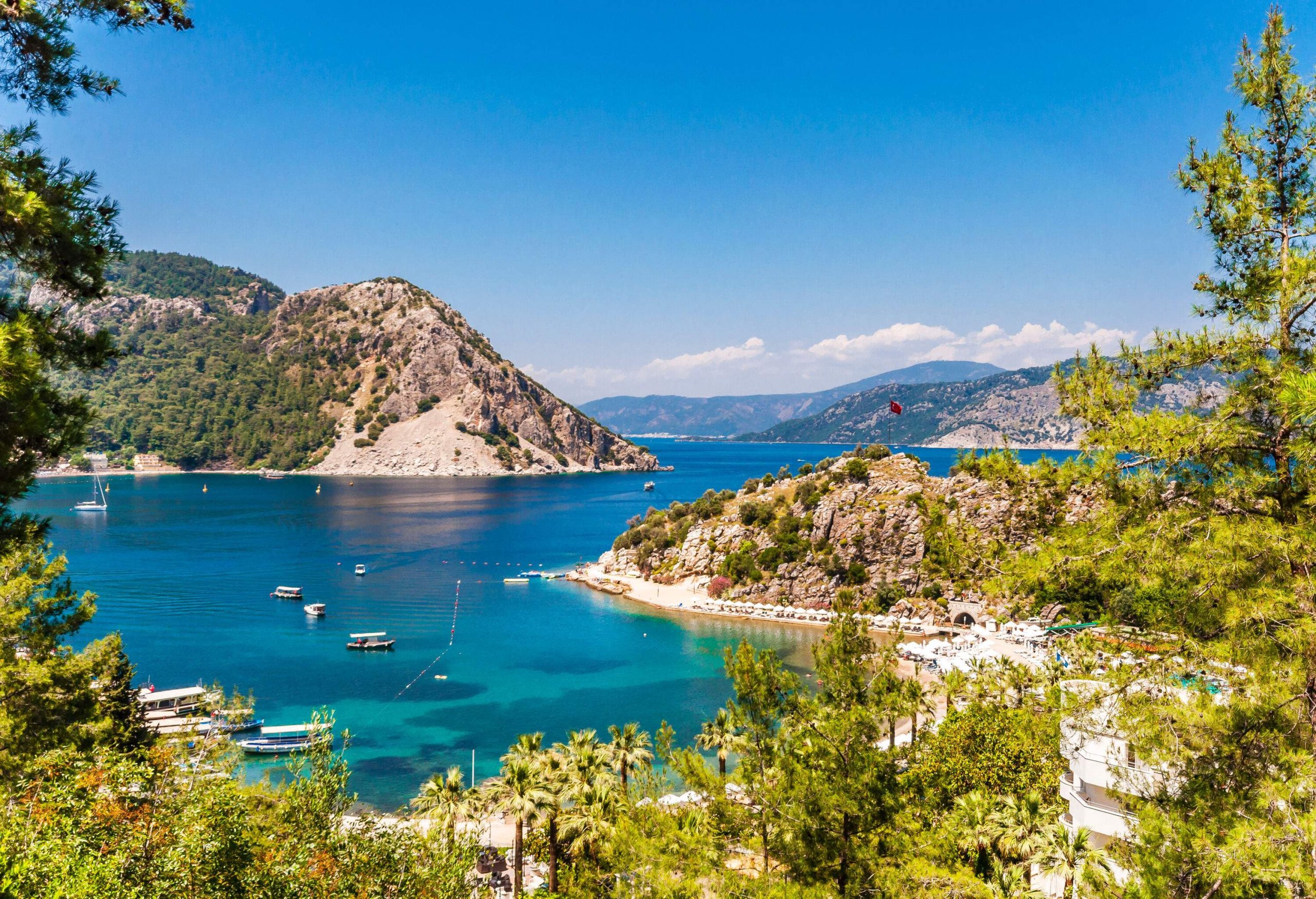 High angle view of blue Mediterranean sea with mountains in background