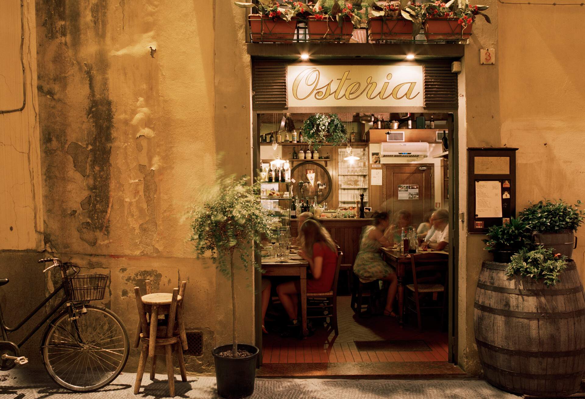 A restaurant entrance with the signage 