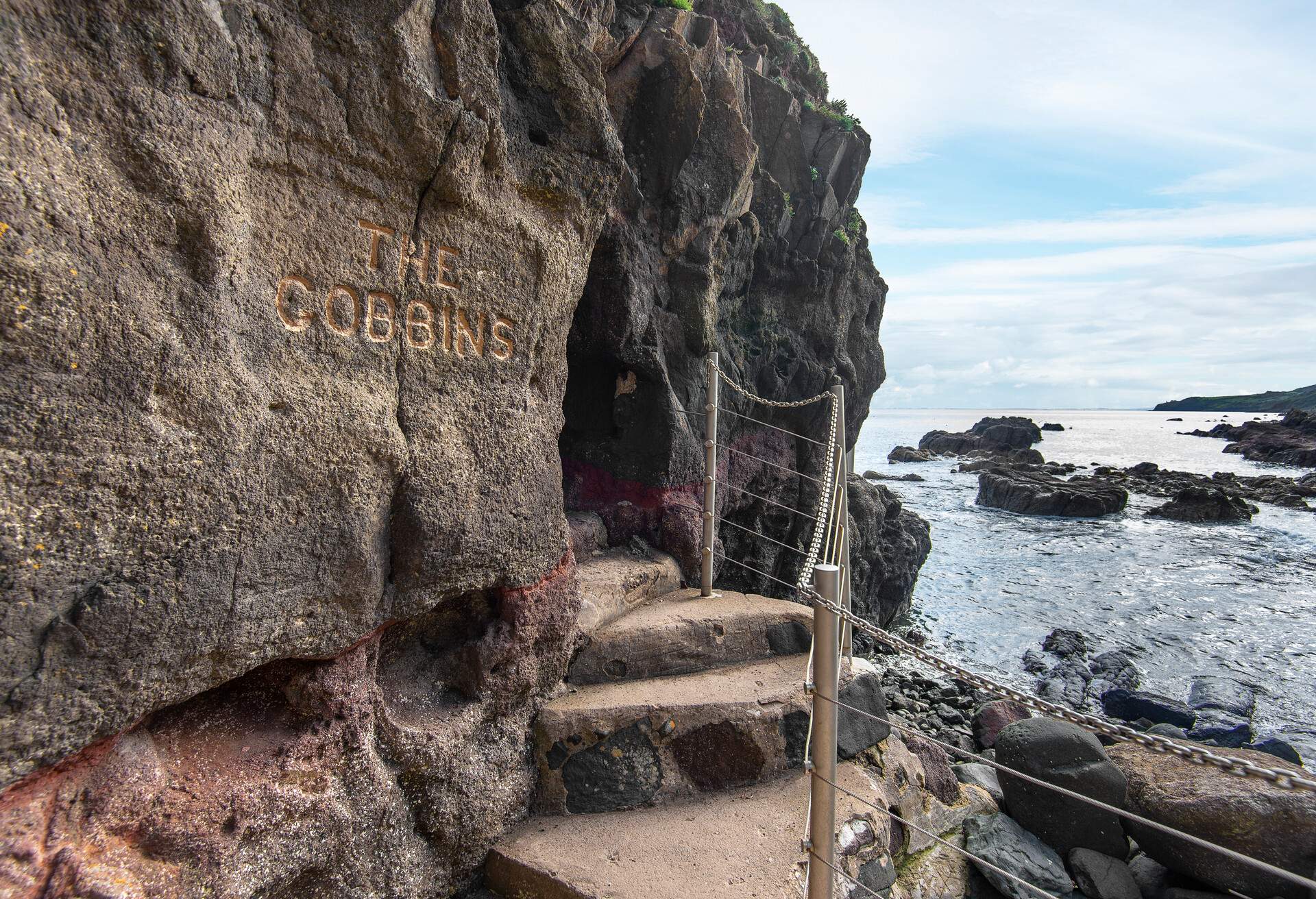 Entrance sign to The Gobbins Path, a cliff path along the cliffs of the Irish sea in County Antrim, near Belfast.