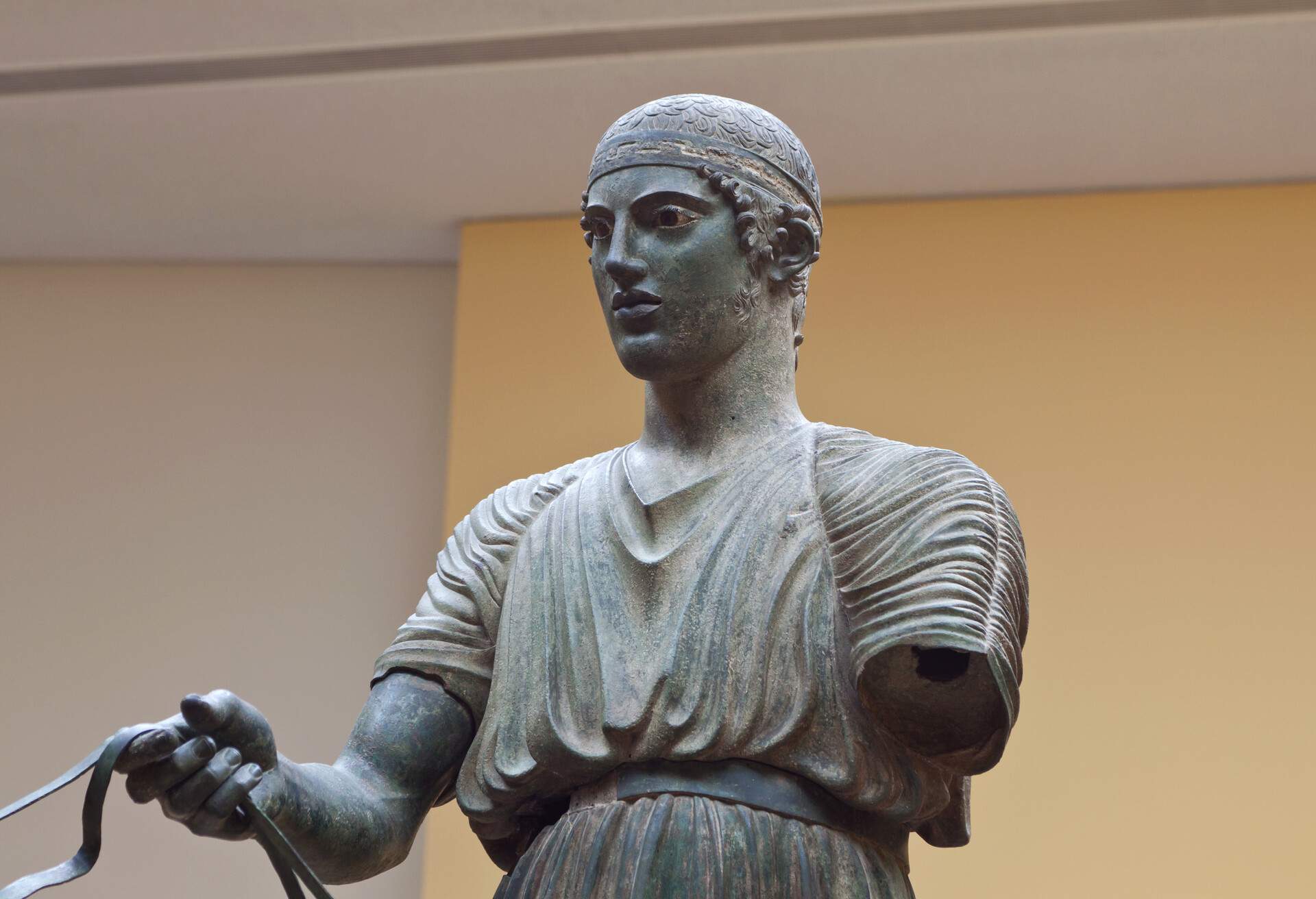 Charioteer statue located at Delphi museum in Greece.