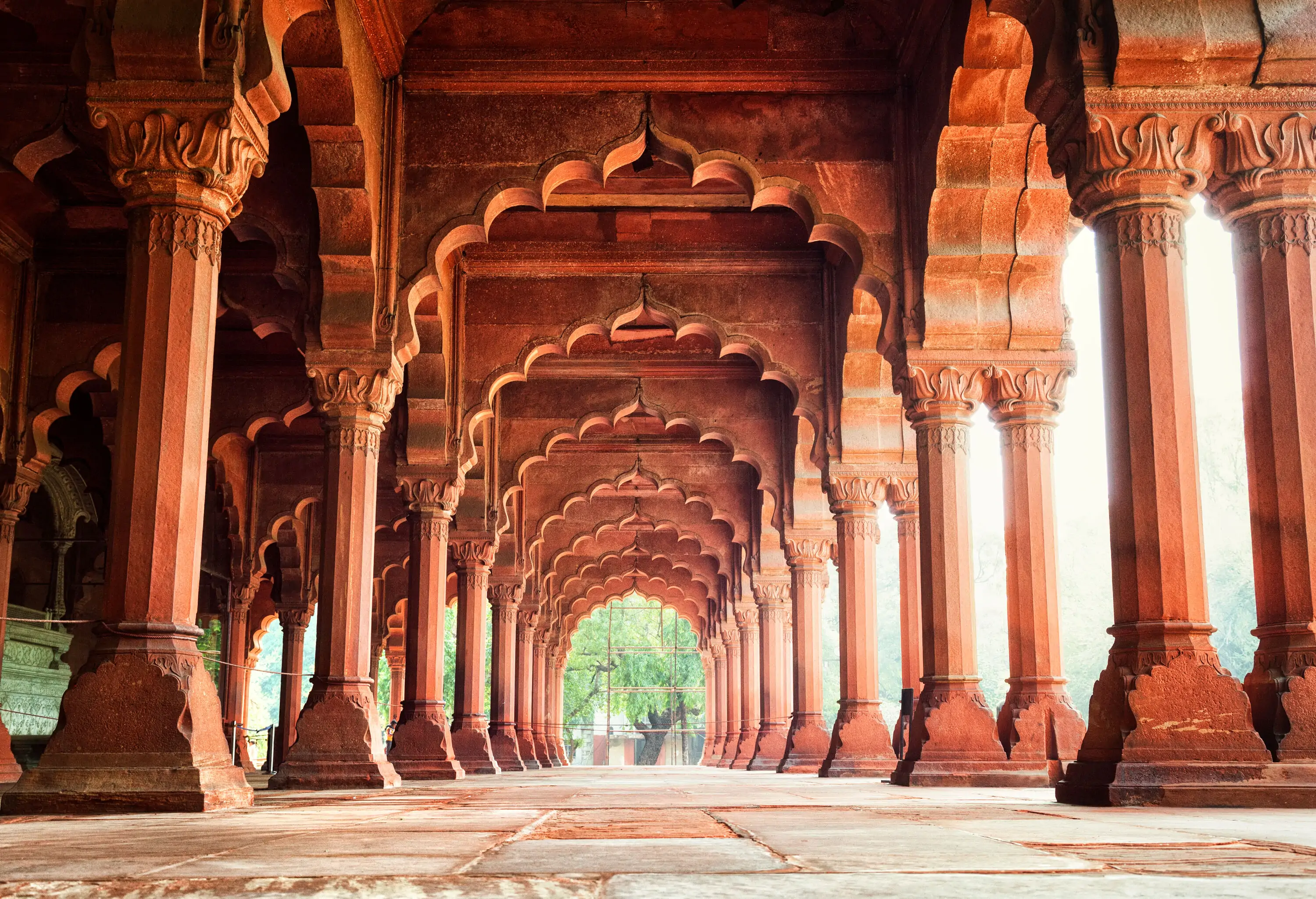 A column-supported hall with cusped arches in rows.