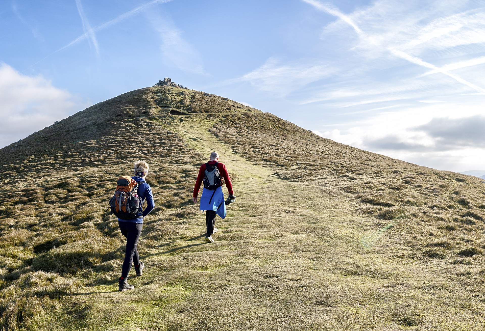 Couple walking up Sugarloaf Mountain on a sunny day