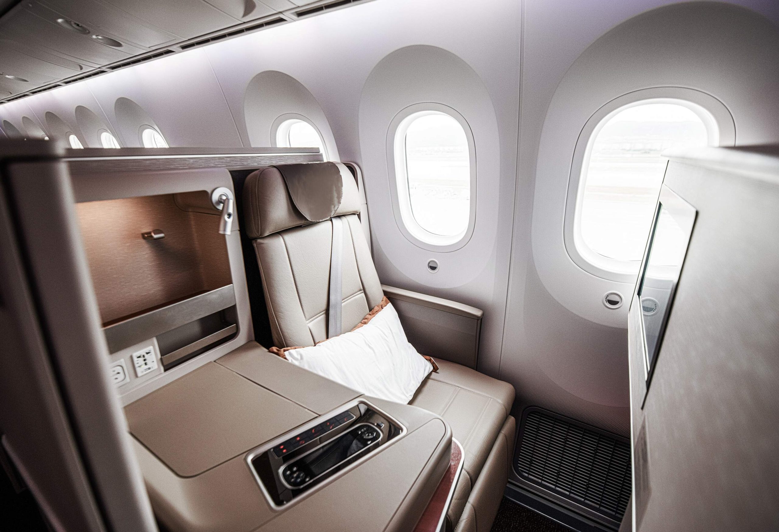 A luxurious seat inside the plane, offering comfort and elegance to passengers.