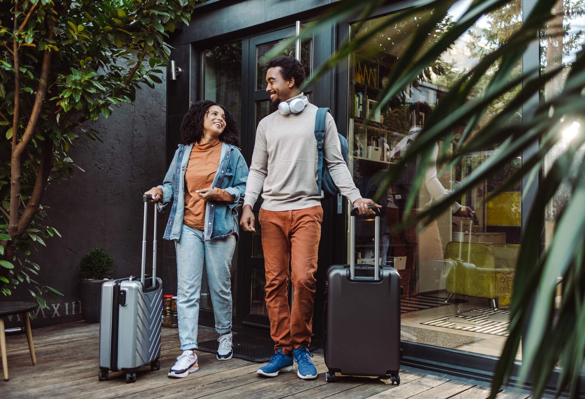 theme_people_couple_man_woman_hotel_suitcase_gettyimages-1454662719-copy