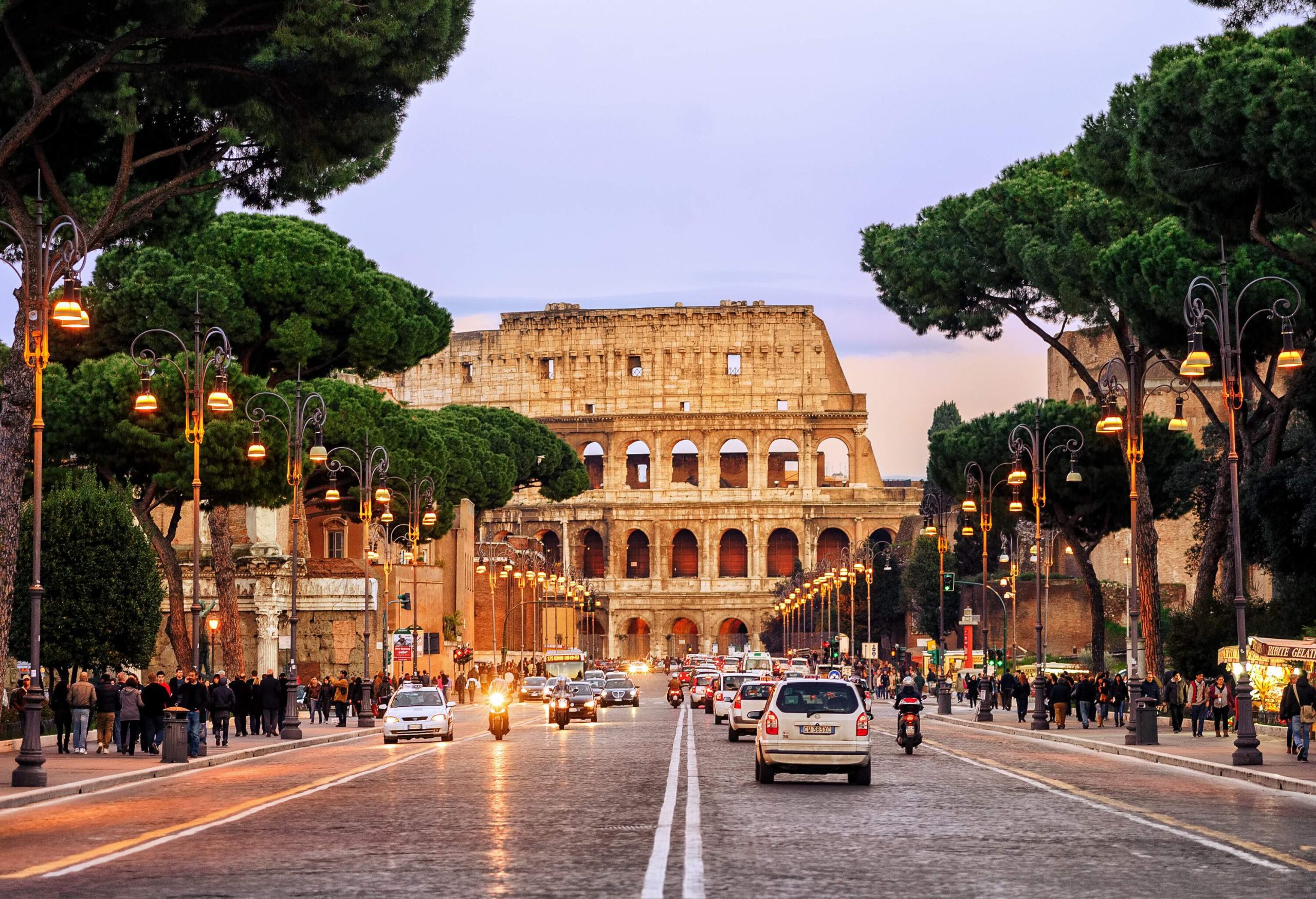 Road in Rome, Italy with the Colosseum in the background
