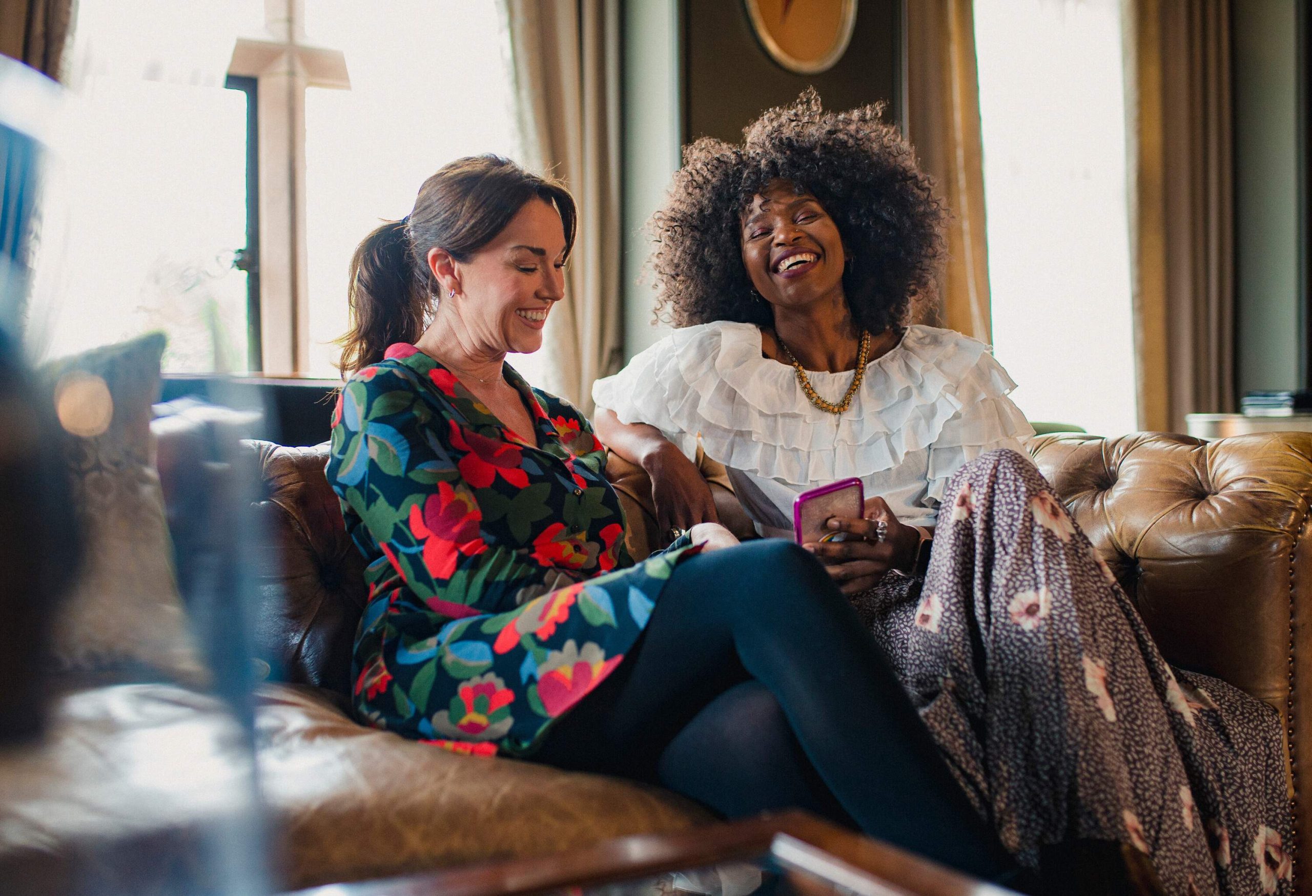 theme_hotel_lobby_people_couple_lgbtq_gettyimages-1169544734